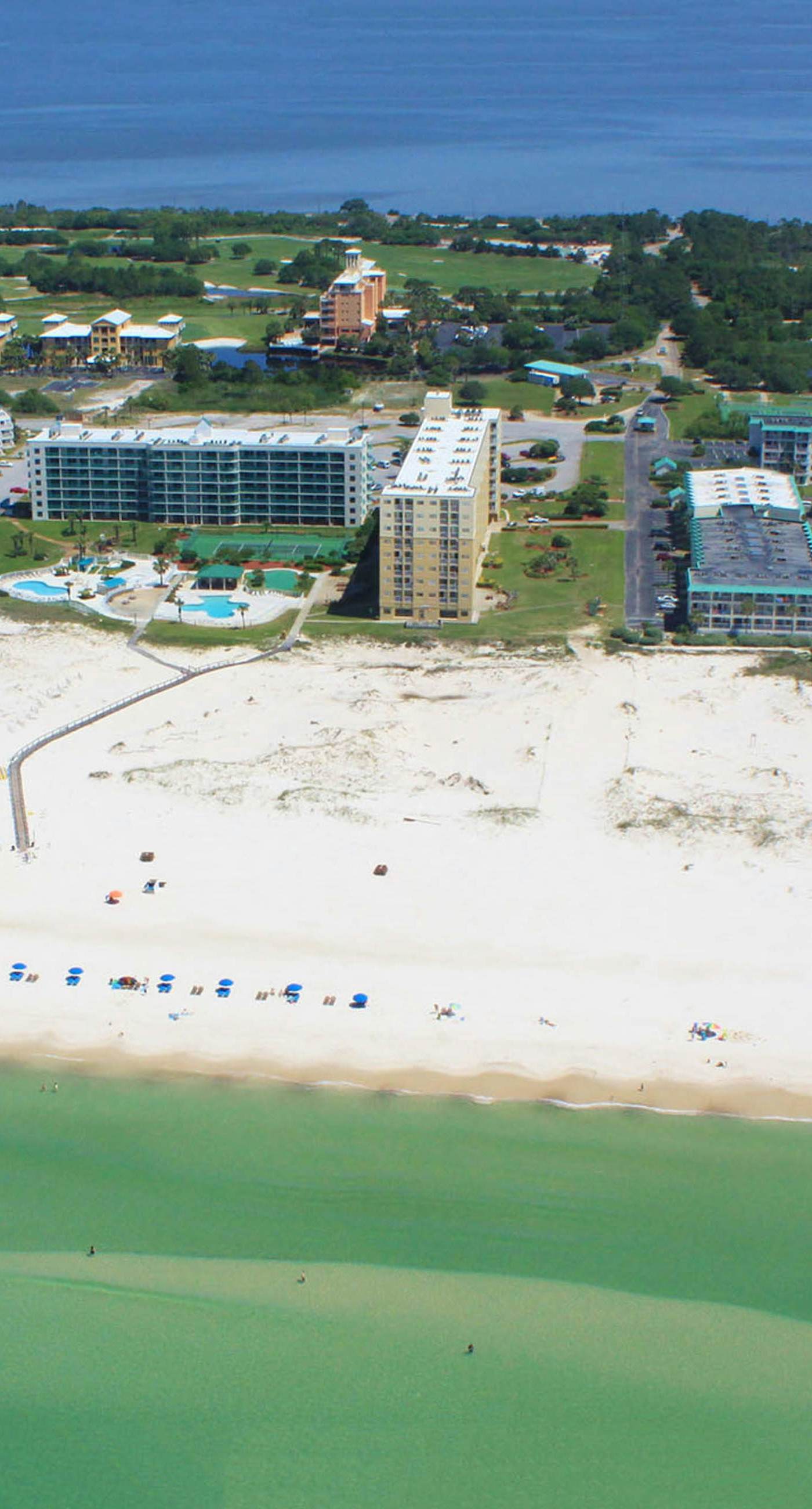 Gulf view home with two-level deck, beach access & shared pools, hot tub, gym