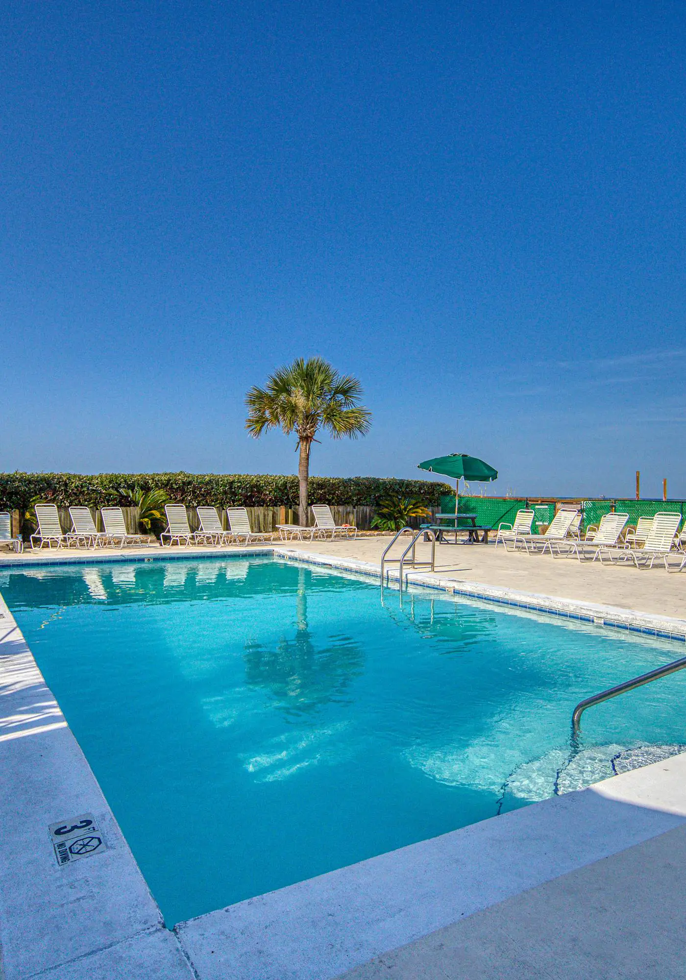 Gulf view home with two-level deck, beach access & shared pools, hot tub, gym