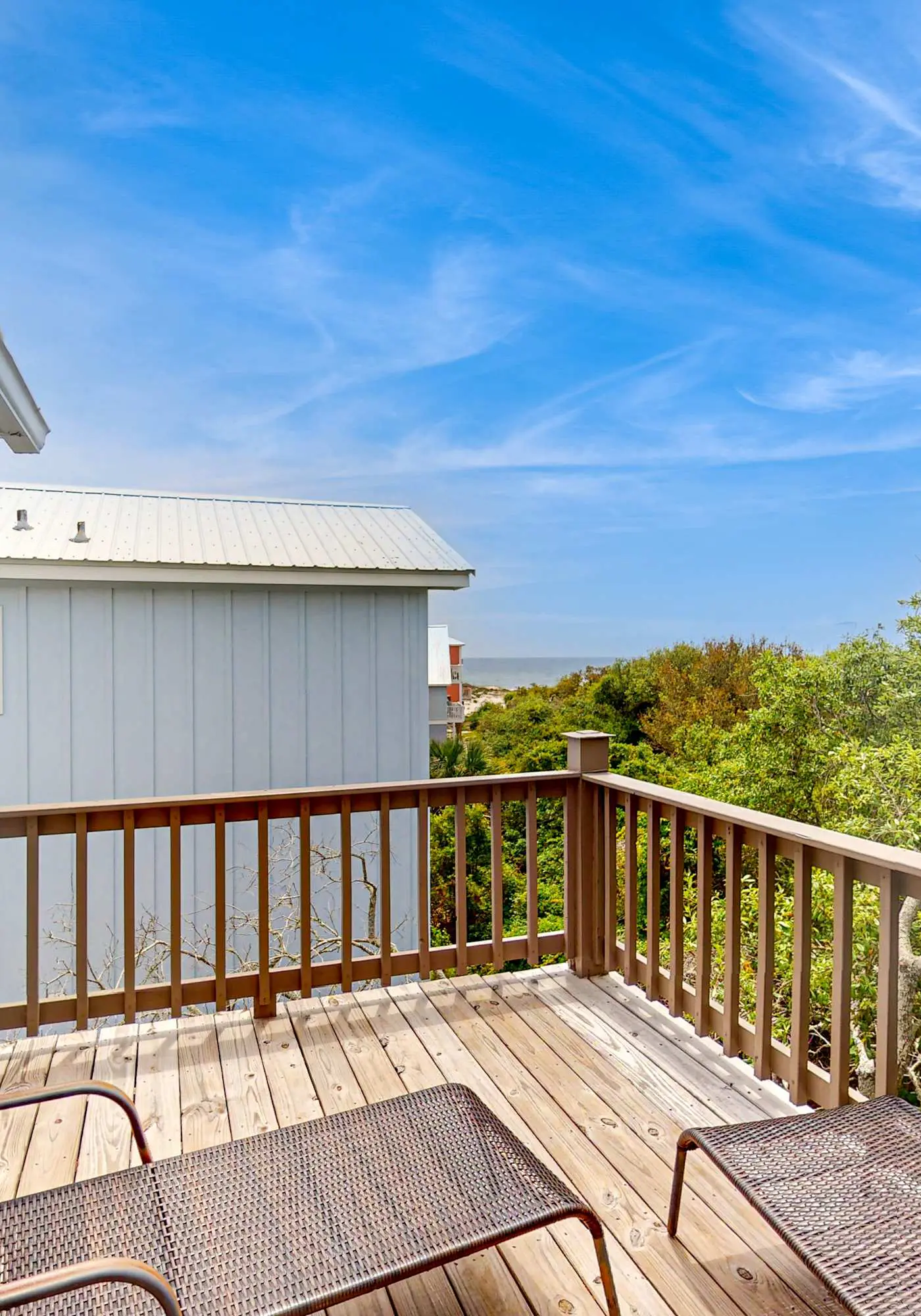 Gulf view home with two-level deck, beach access & shared pools, hot tub, gym
