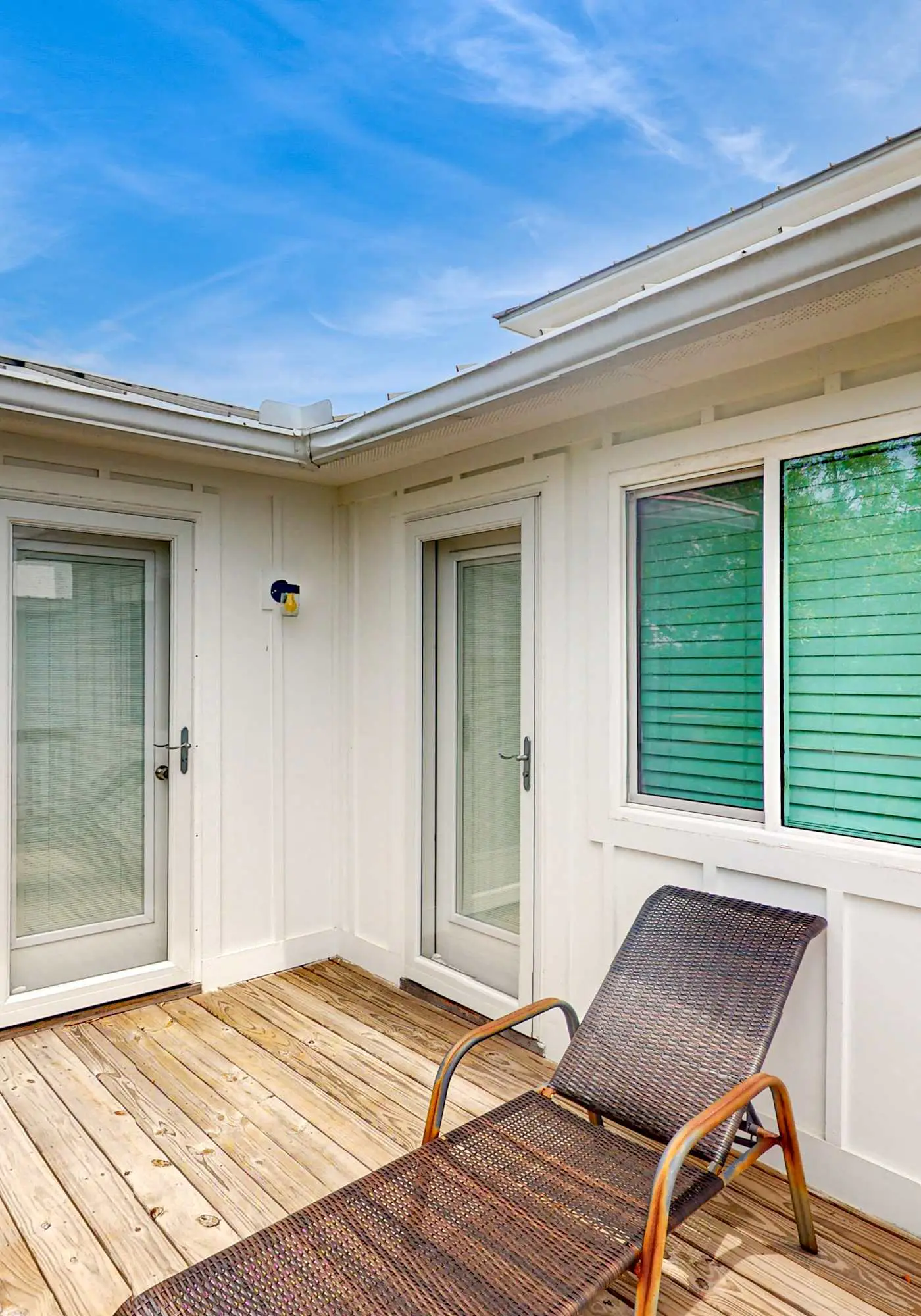 Gulf view home with two-level deck, beach access & shared pools, hot tub, gym