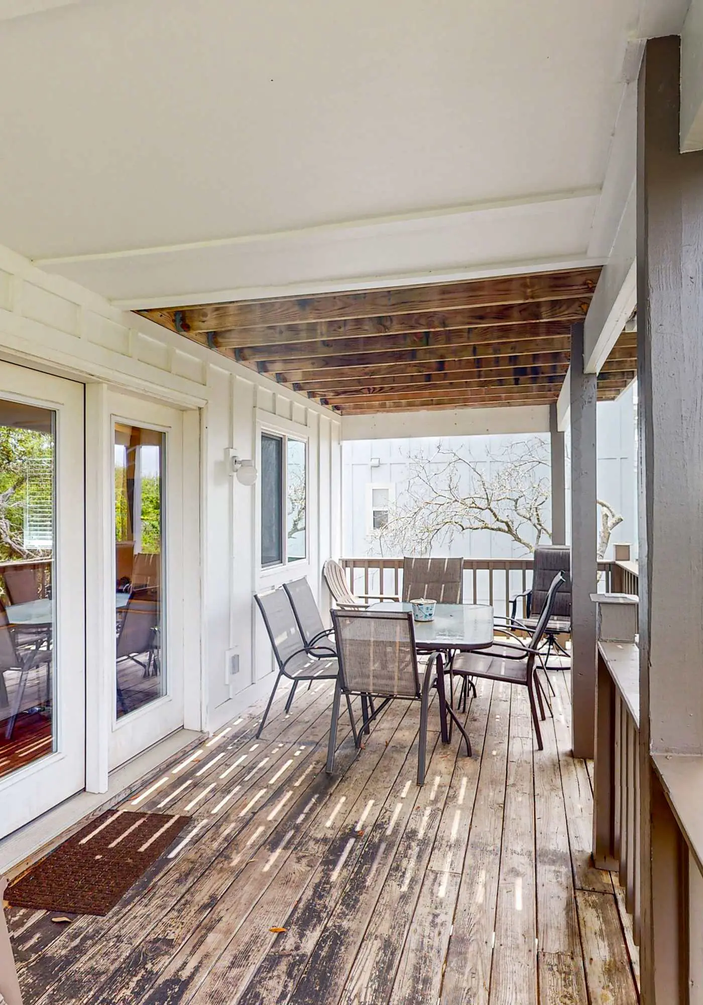 Gulf view home with two-level deck, beach access & shared pools, hot tub, gym