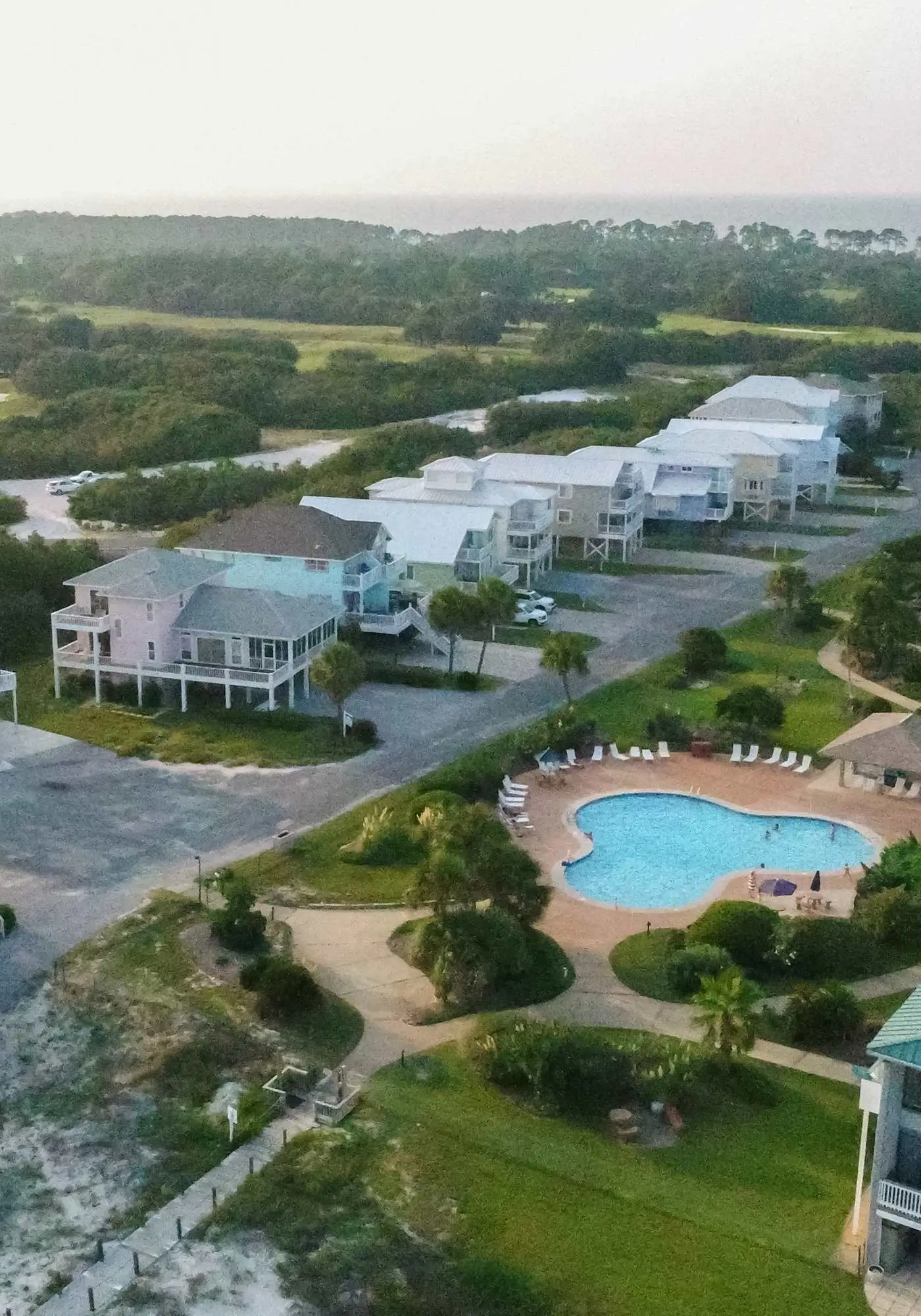 Gulf view home with two-level deck, beach access & shared pools, hot tub, gym