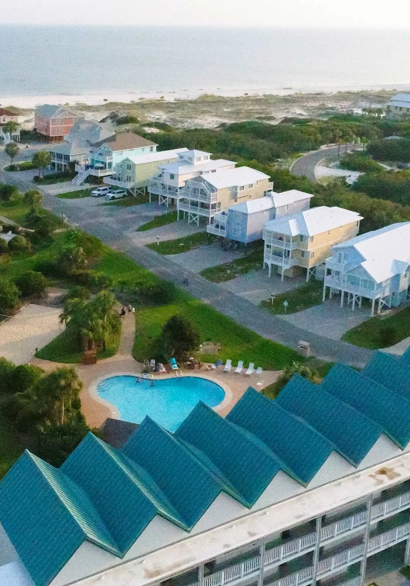 Gulf view home with two-level deck, beach access & shared pools, hot tub, gym