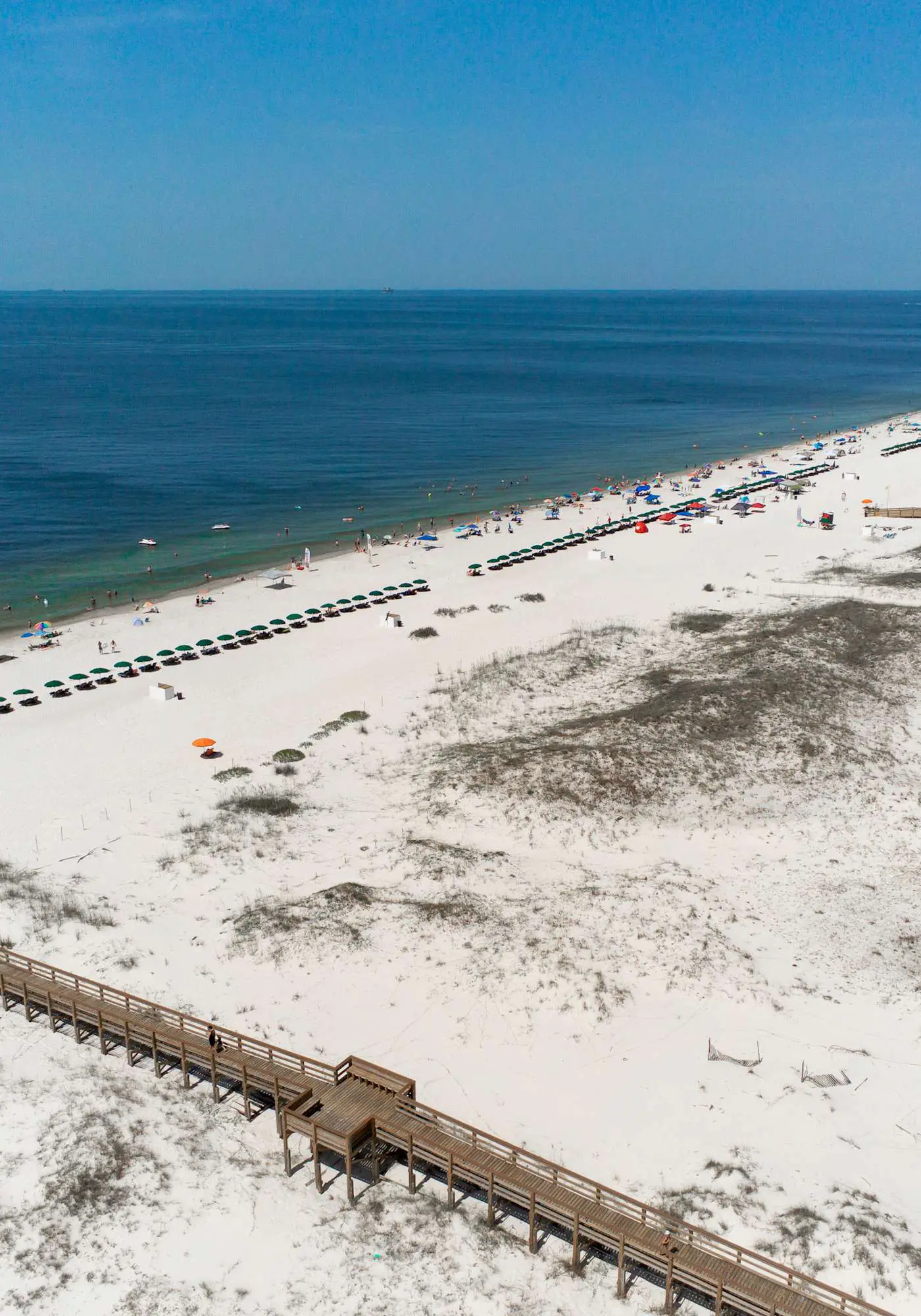 Gulf view home with two-level deck, beach access & shared pools, hot tub, gym