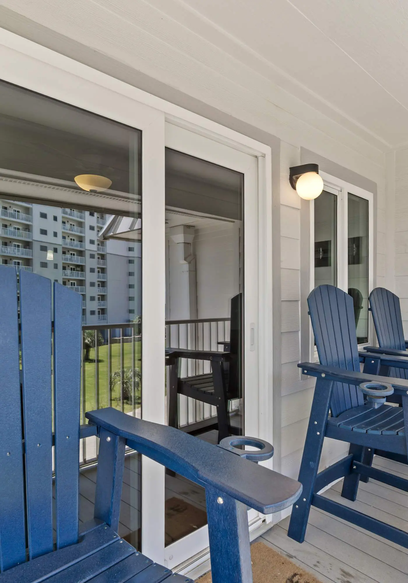 Third-floor condo with pool, hot tub, partial ocean view, gym, & central AC