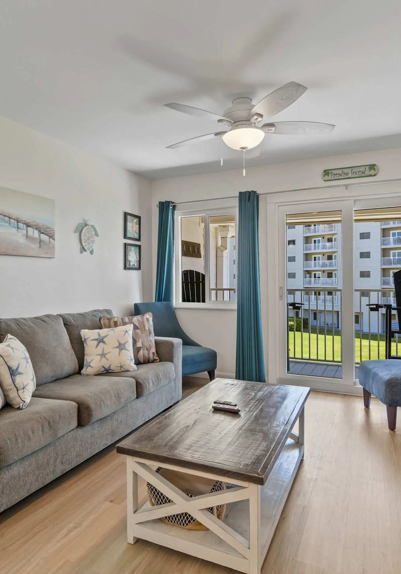 Third-floor condo with pool, hot tub, partial ocean view, gym, & central AC