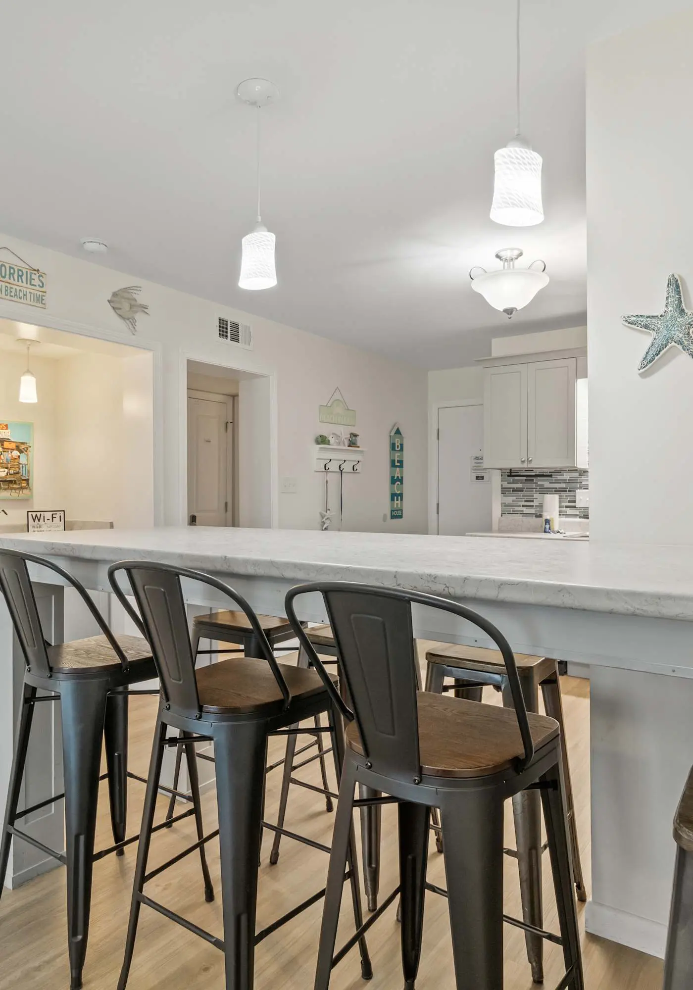 Third-floor condo with pool, hot tub, partial ocean view, gym, & central AC