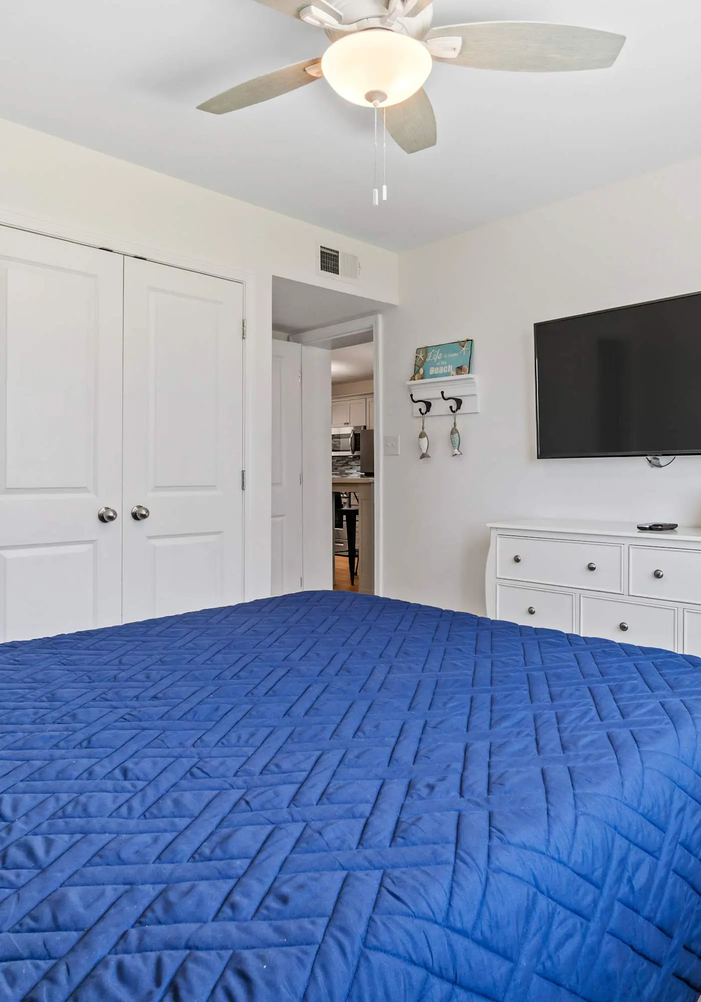 Third-floor condo with pool, hot tub, partial ocean view, gym, & central AC