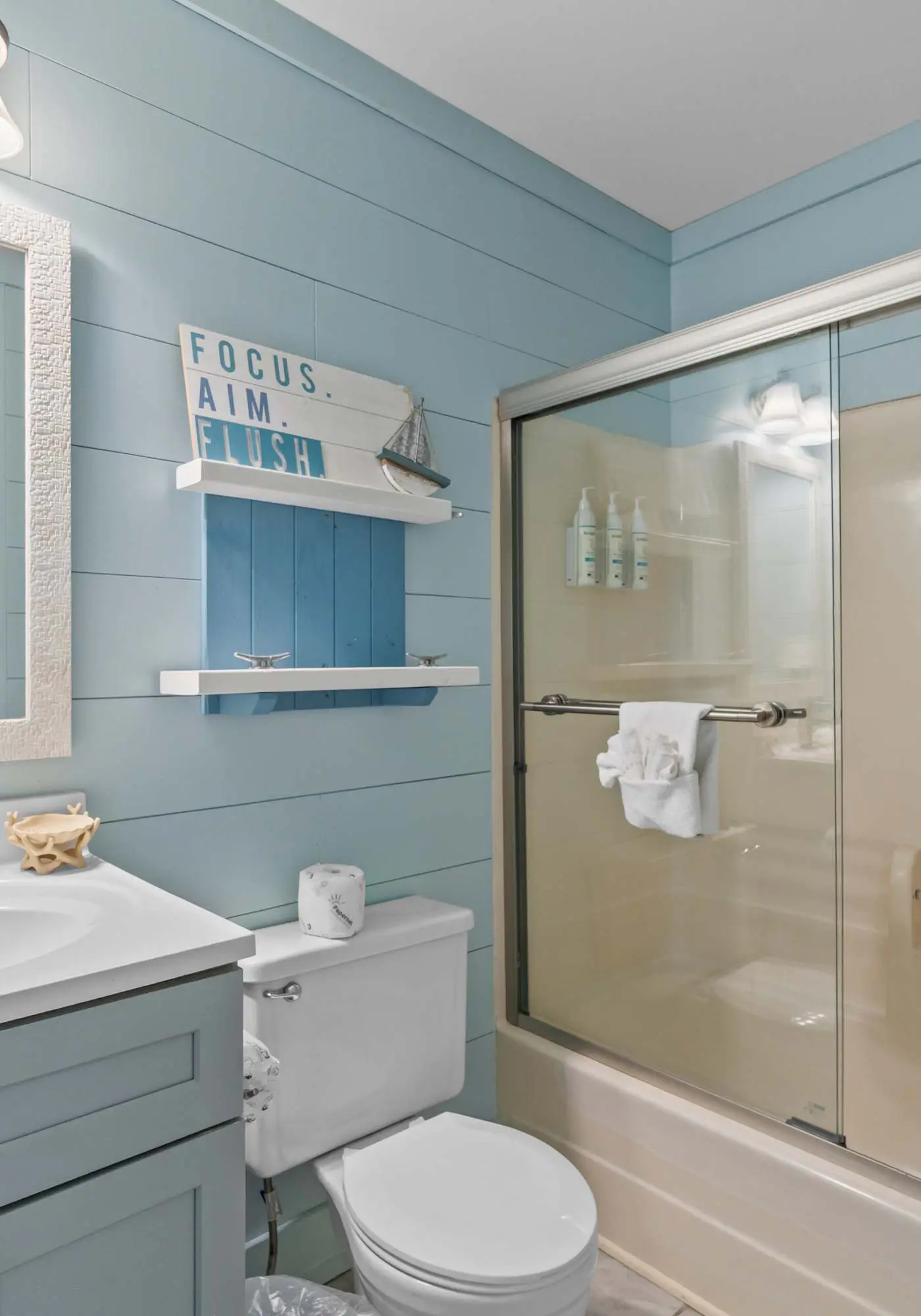 Third-floor condo with pool, hot tub, partial ocean view, gym, & central AC