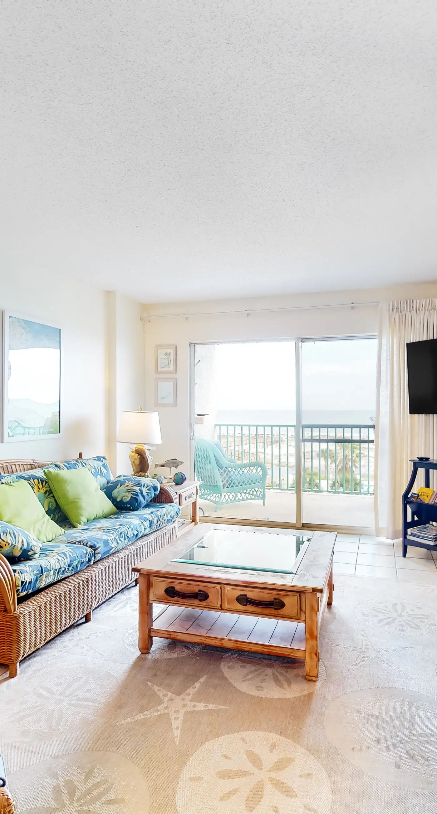Oceanfront condo with Gulf-view balcony, beach access, pool, WiFi, & central AC