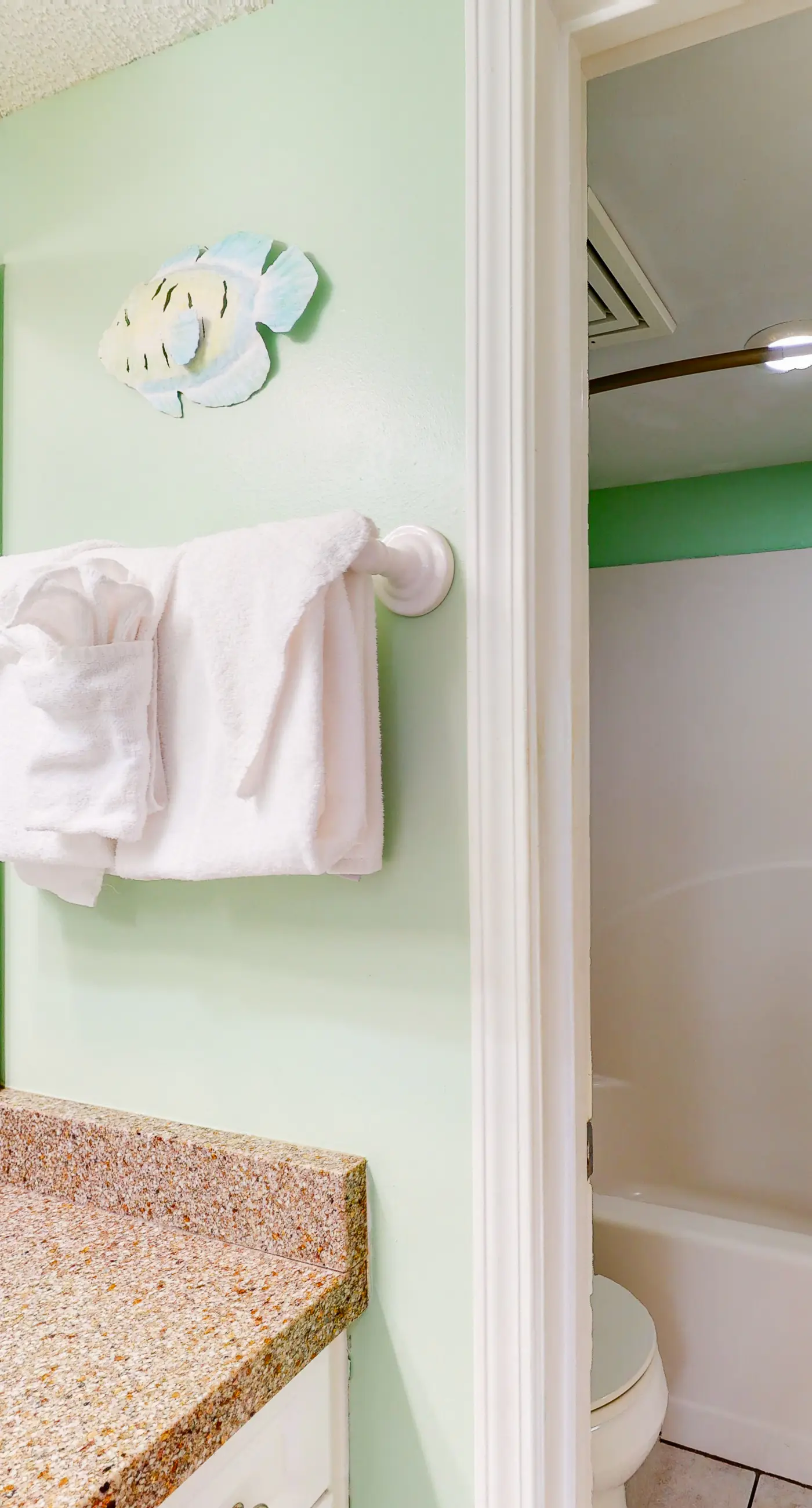 Oceanfront condo with Gulf-view balcony, beach access, pool, WiFi, & central AC