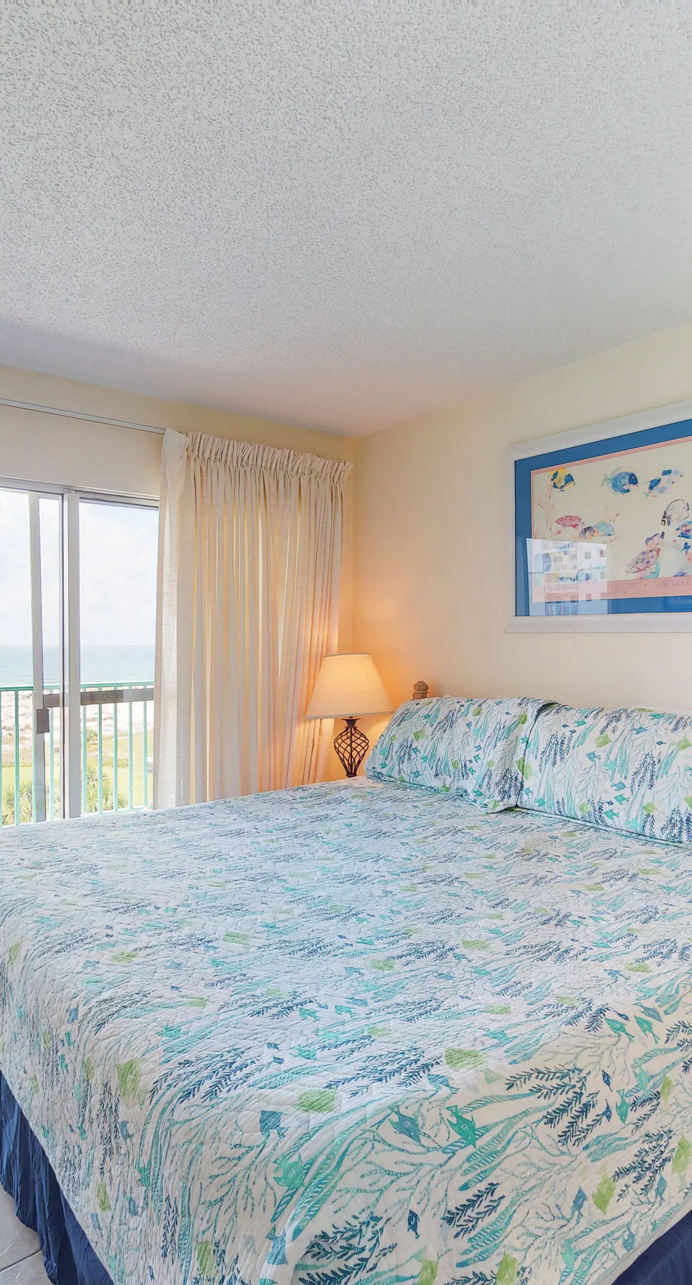 Oceanfront condo with Gulf-view balcony, beach access, pool, WiFi, & central AC