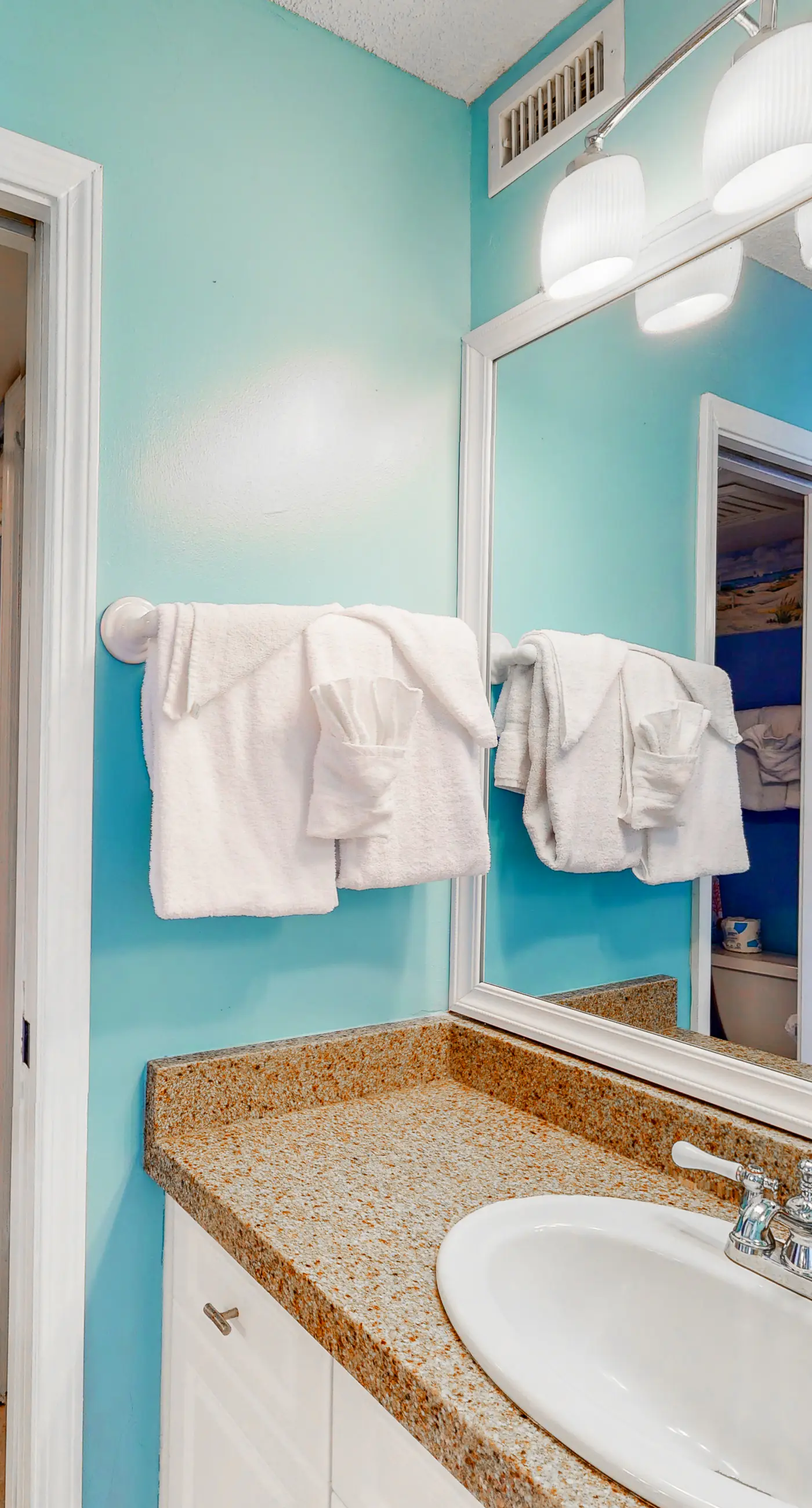 Oceanfront condo with Gulf-view balcony, beach access, pool, WiFi, & central AC