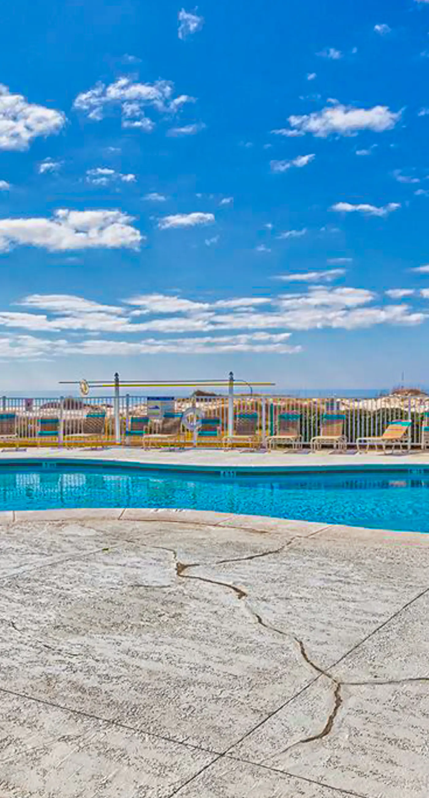 Oceanfront condo with Gulf-view balcony, beach access, pool, WiFi, & central AC