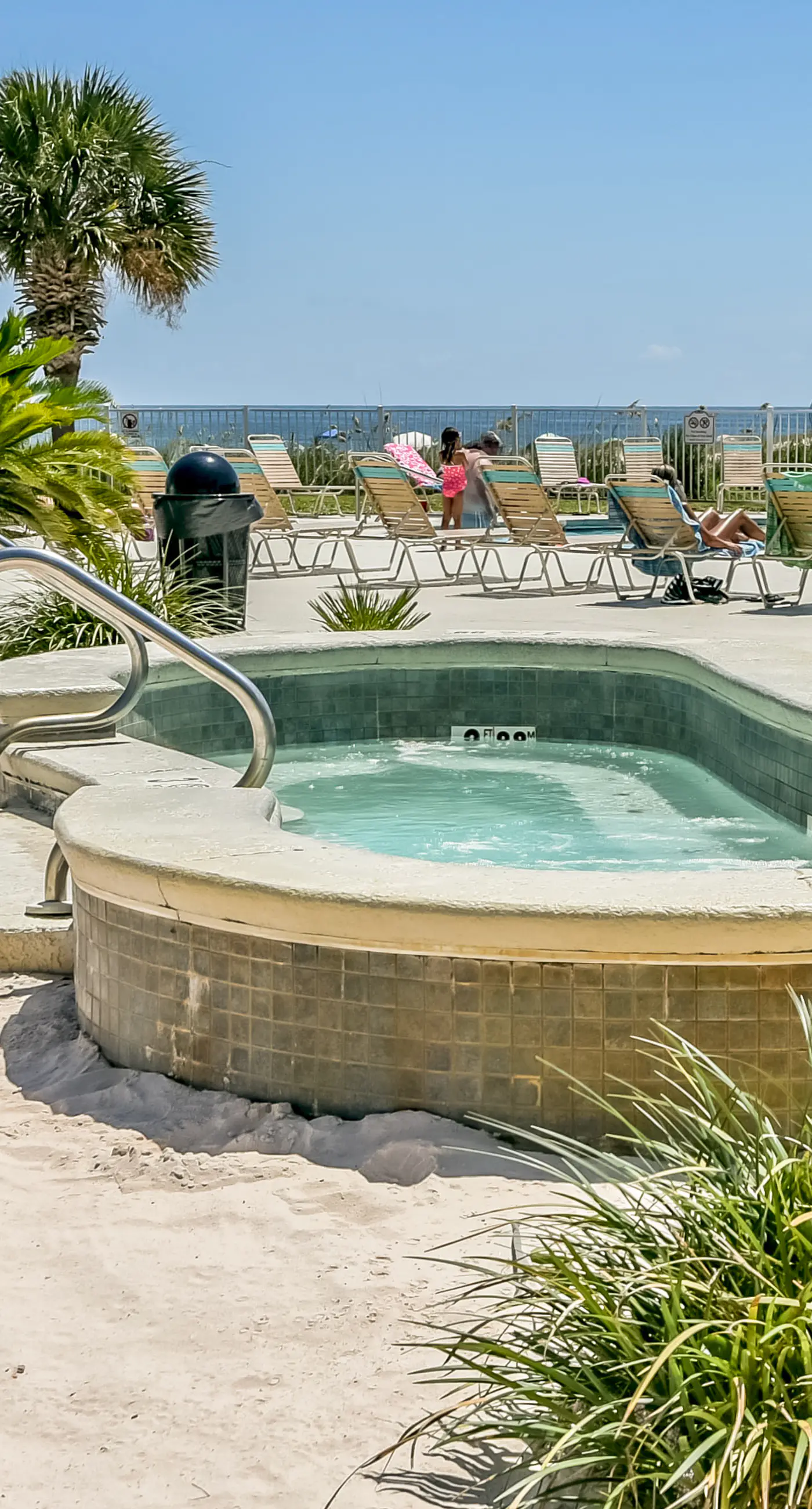 Oceanfront condo with Gulf-view balcony, beach access, pool, WiFi, & central AC