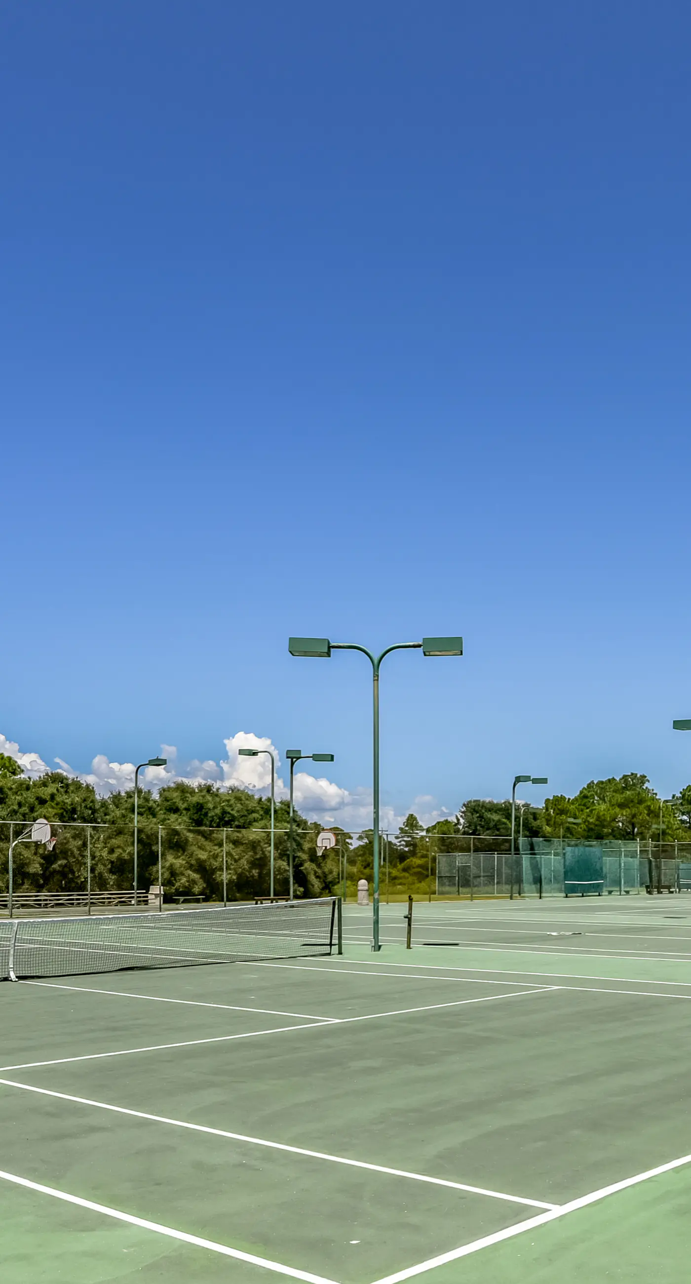 Oceanfront condo with Gulf-view balcony, beach access, pool, WiFi, & central AC