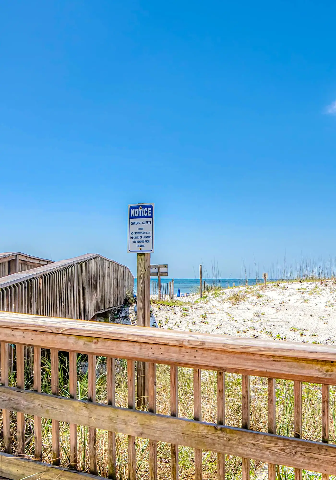 Waterfront condo with a full kitchen, pool, & beach access