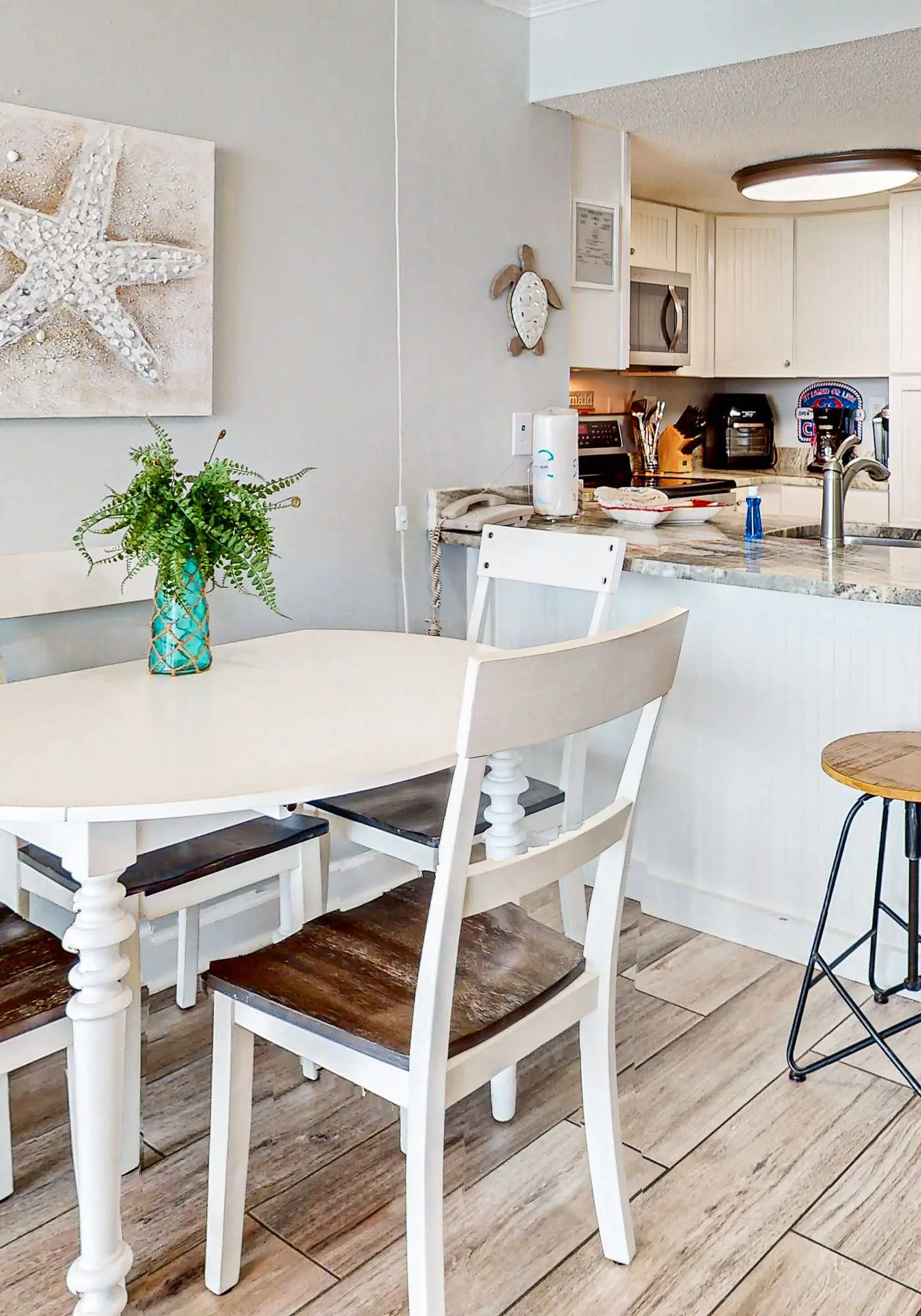 Waterfront condo with a full kitchen, pool, & beach access