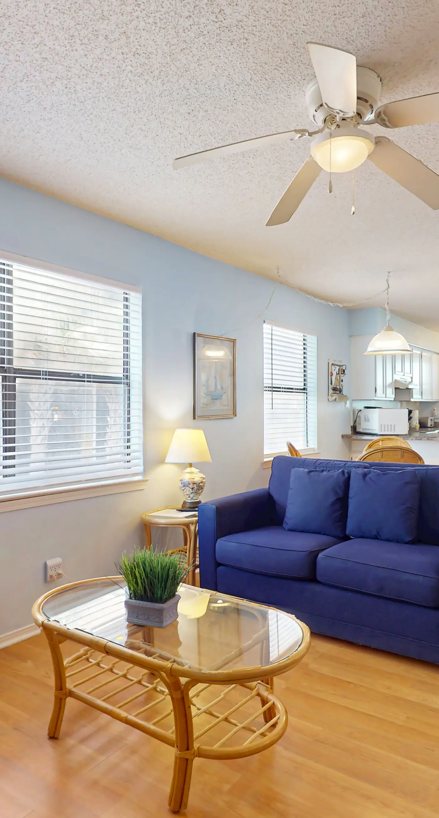 Waterfront condo with a furnished balcony, peek-a-boo Gulf views, & shared pools