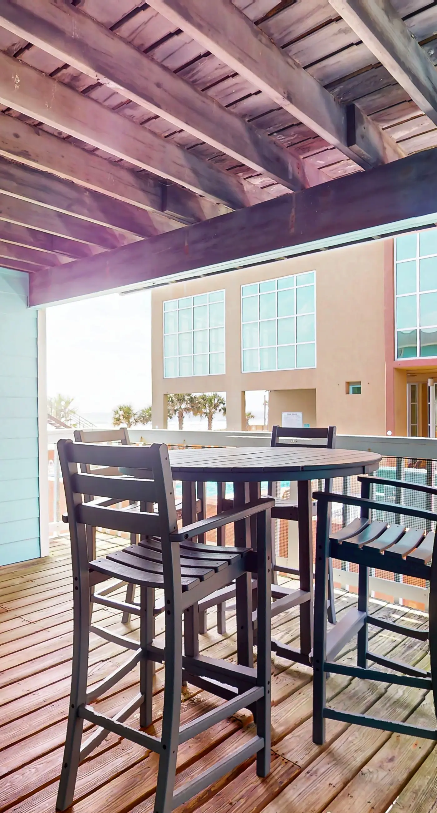 Waterfront condo with a furnished balcony, peek-a-boo Gulf views, & shared pools