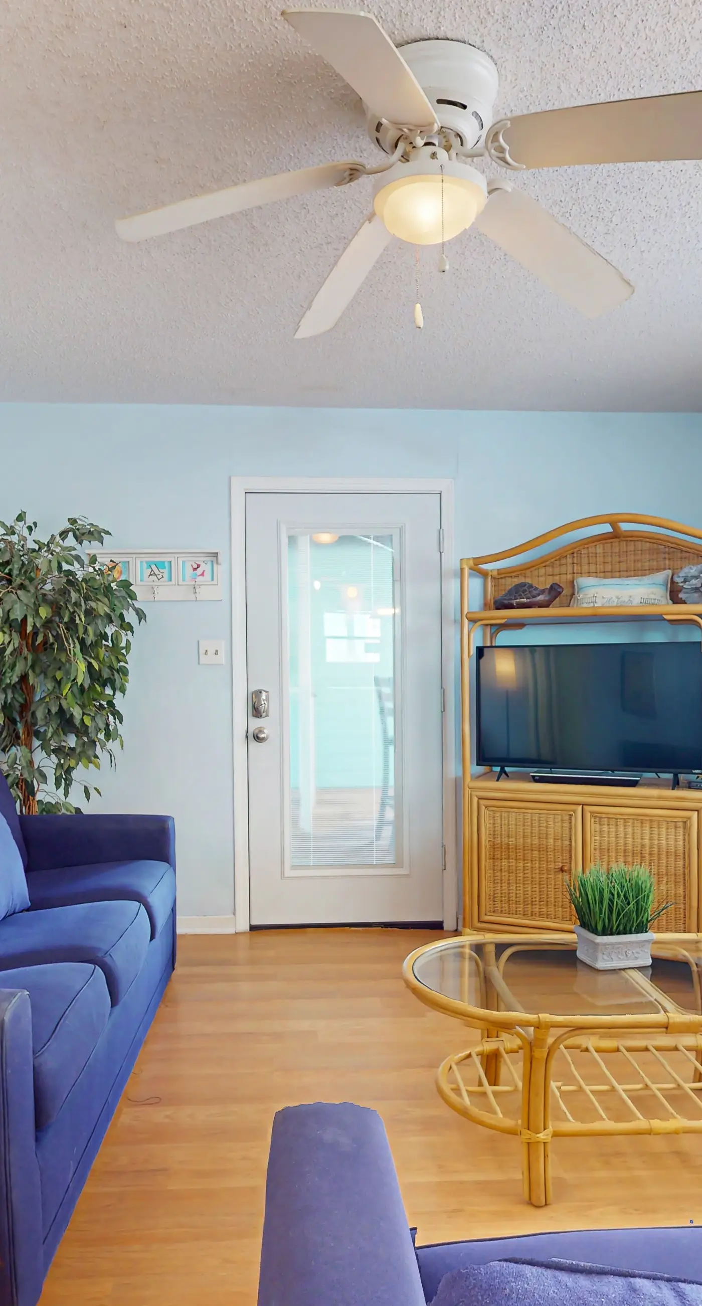 Waterfront condo with a furnished balcony, peek-a-boo Gulf views, & shared pools