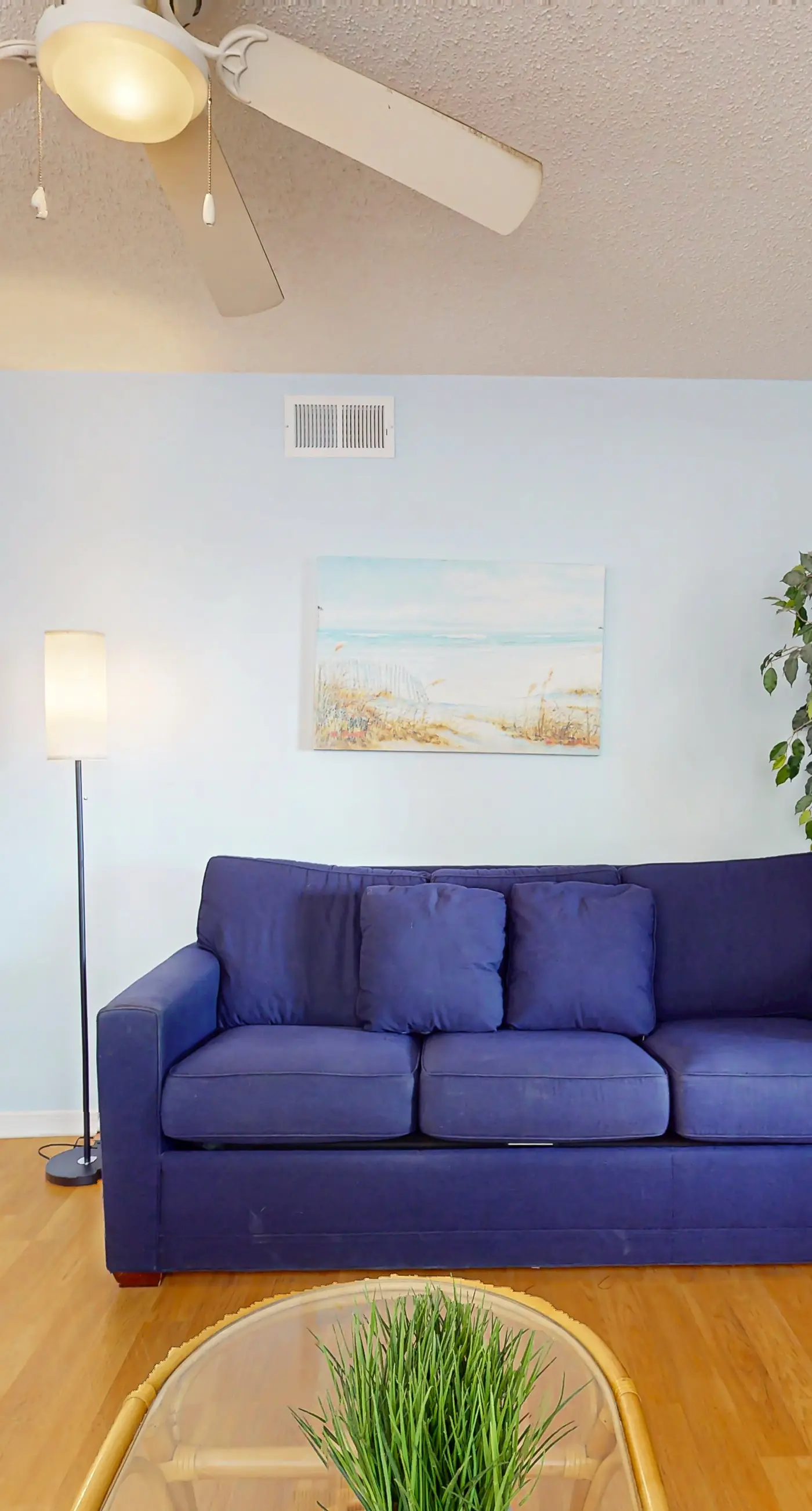 Waterfront condo with a furnished balcony, peek-a-boo Gulf views, & shared pools