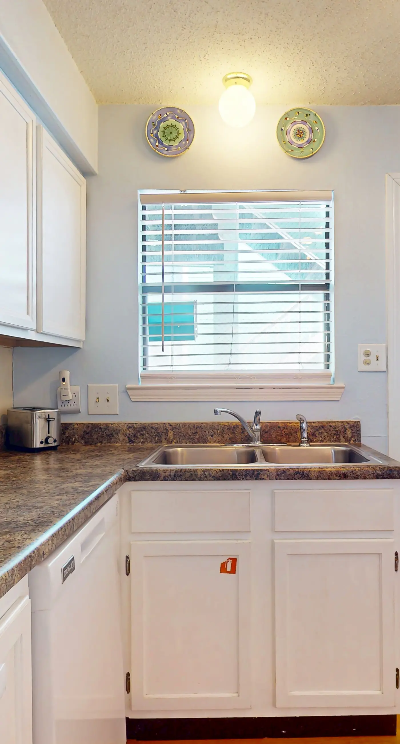 Waterfront condo with a furnished balcony, peek-a-boo Gulf views, & shared pools