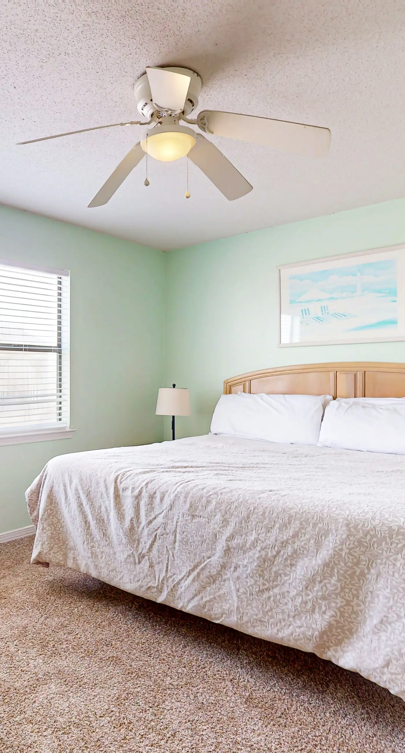 Waterfront condo with a furnished balcony, peek-a-boo Gulf views, & shared pools