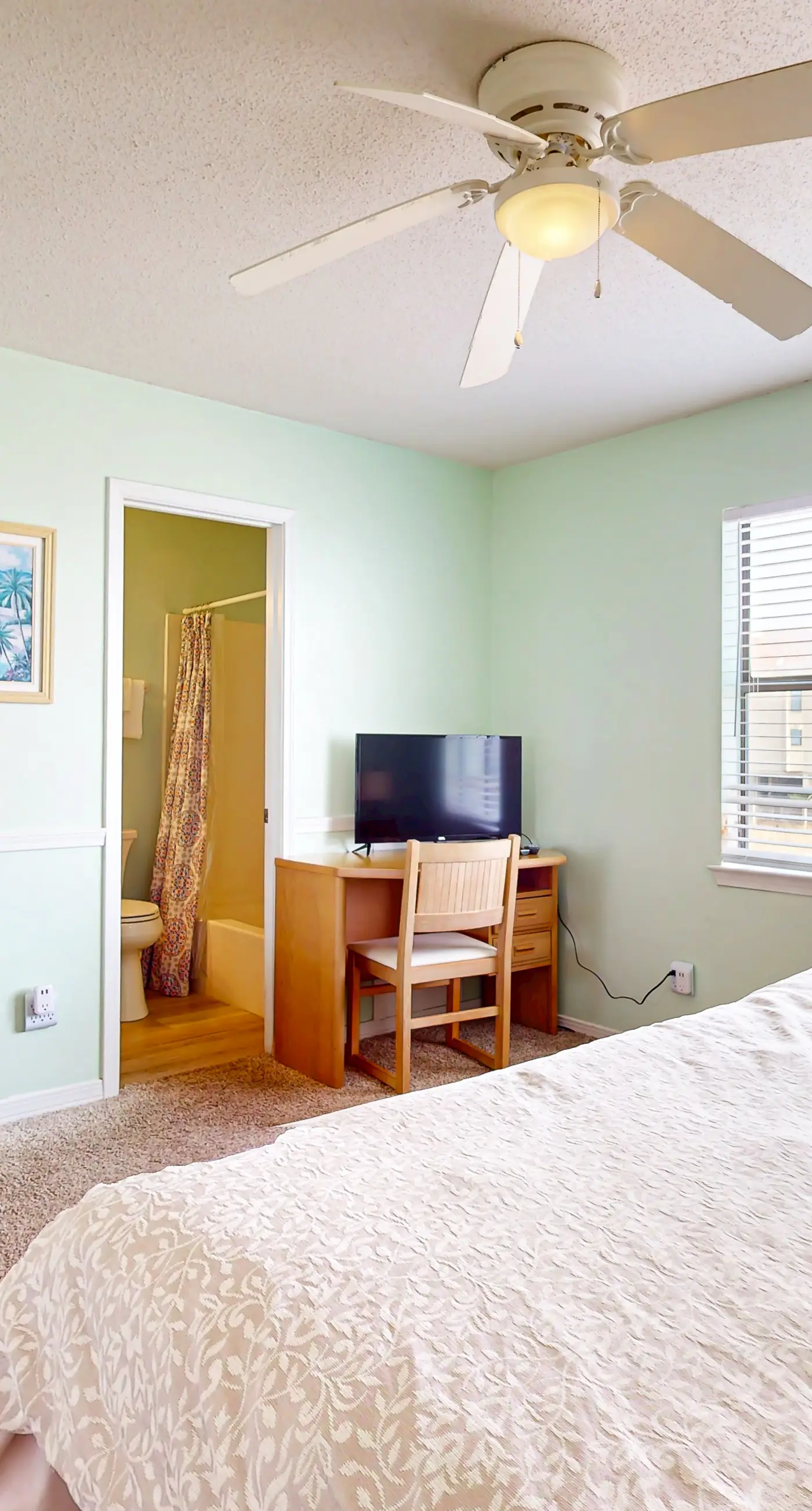 Waterfront condo with a furnished balcony, peek-a-boo Gulf views, & shared pools