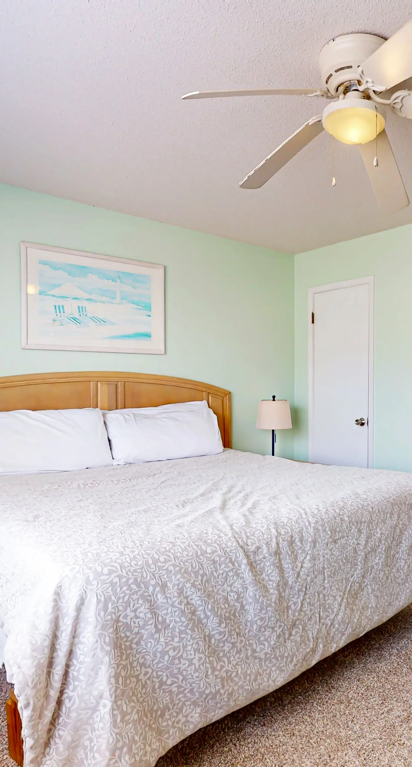 Waterfront condo with a furnished balcony, peek-a-boo Gulf views, & shared pools