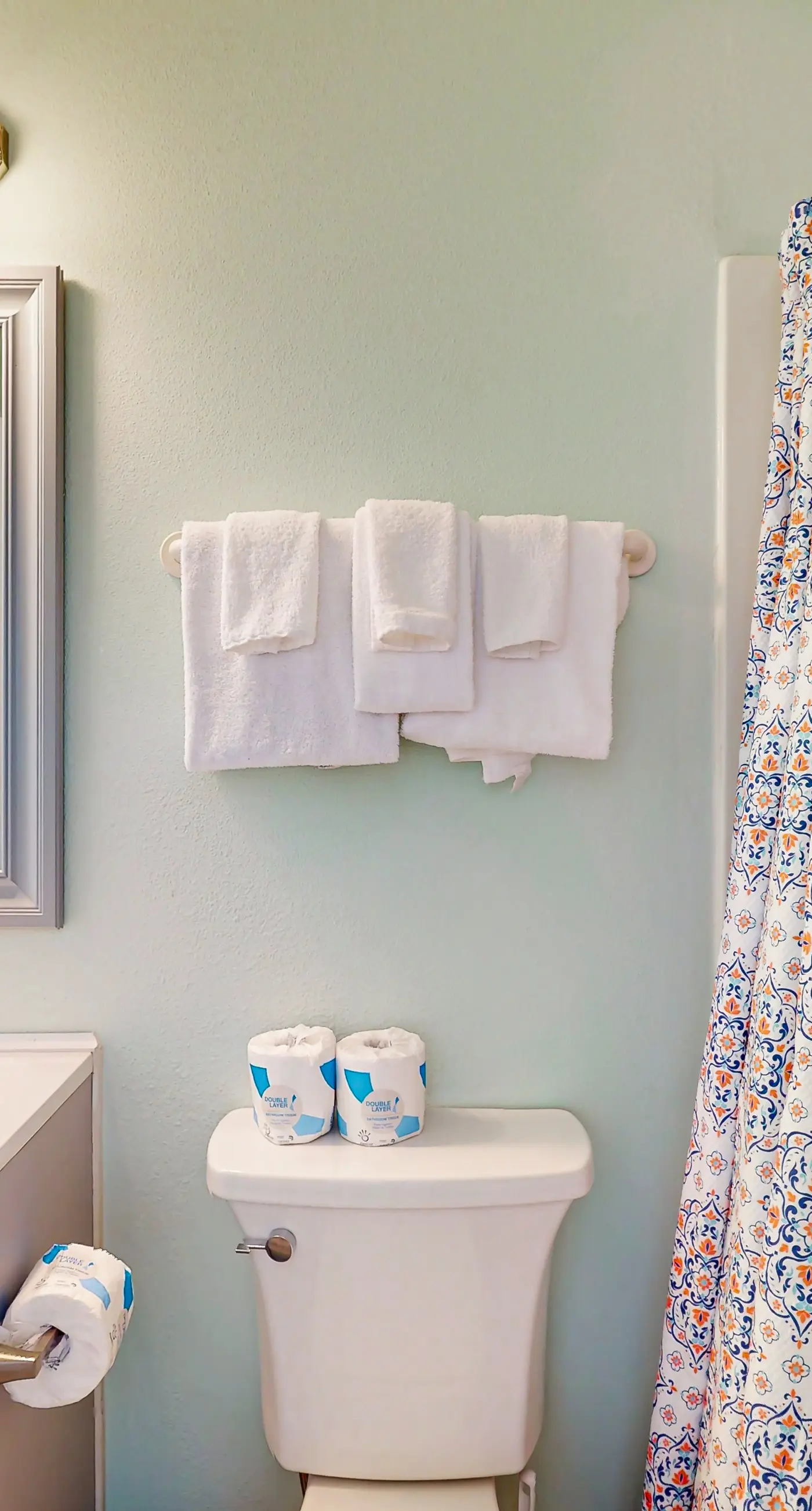 Waterfront condo with a furnished balcony, peek-a-boo Gulf views, & shared pools