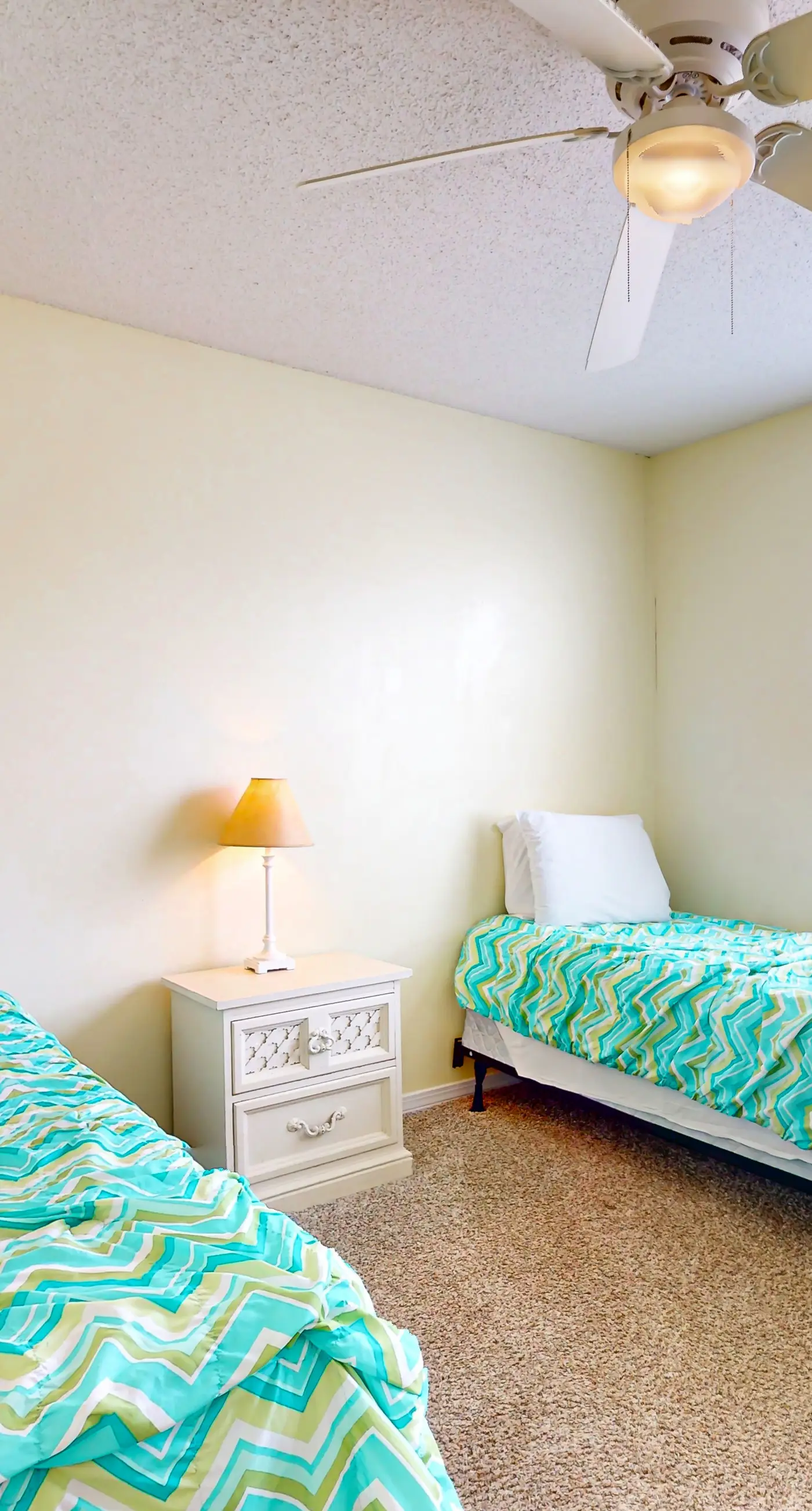 Waterfront condo with a furnished balcony, peek-a-boo Gulf views, & shared pools