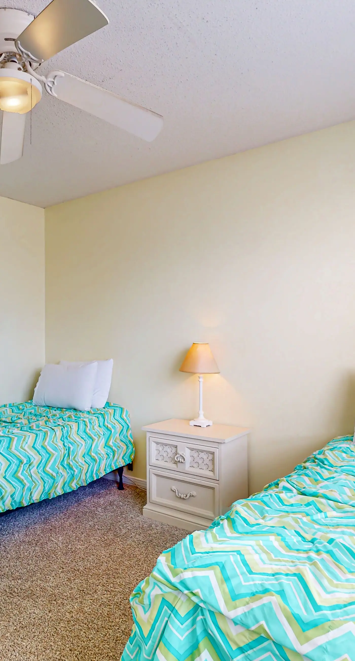 Waterfront condo with a furnished balcony, peek-a-boo Gulf views, & shared pools