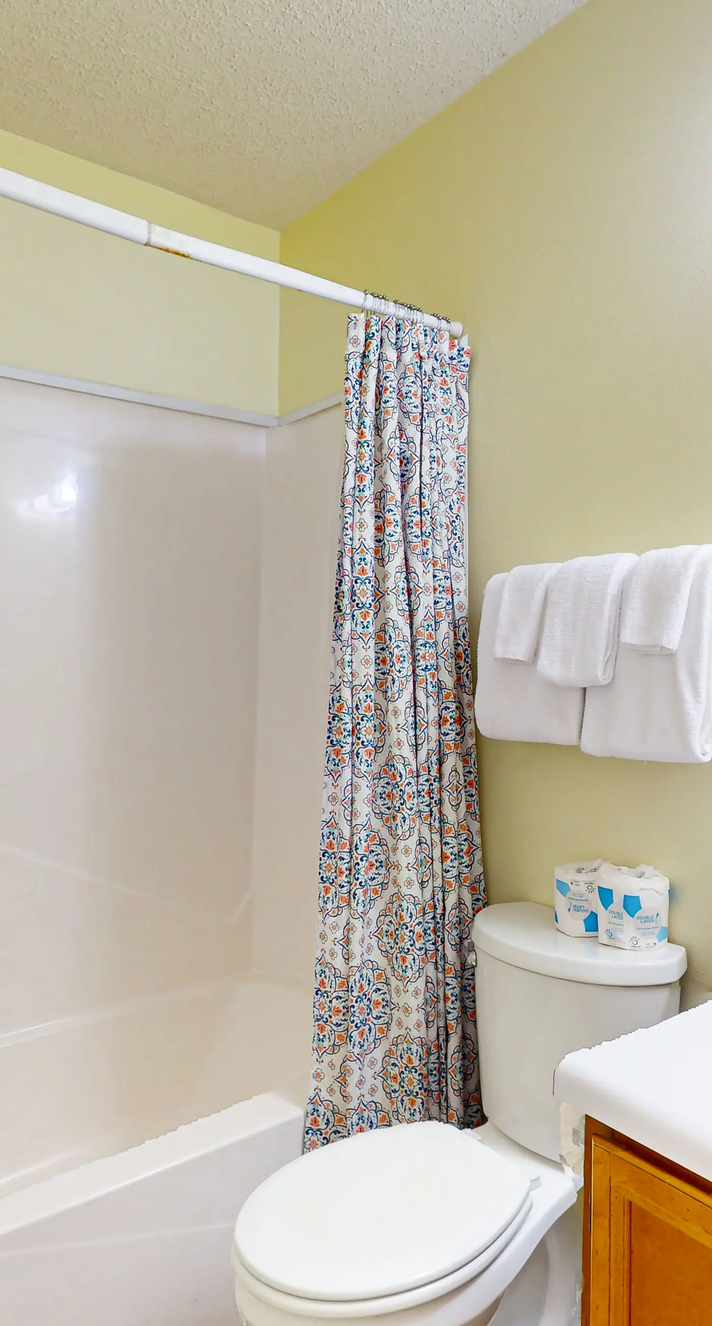 Waterfront condo with a furnished balcony, peek-a-boo Gulf views, & shared pools