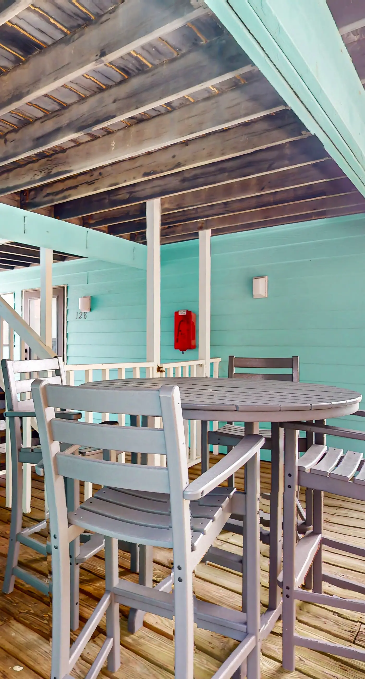 Waterfront condo with a furnished balcony, peek-a-boo Gulf views, & shared pools