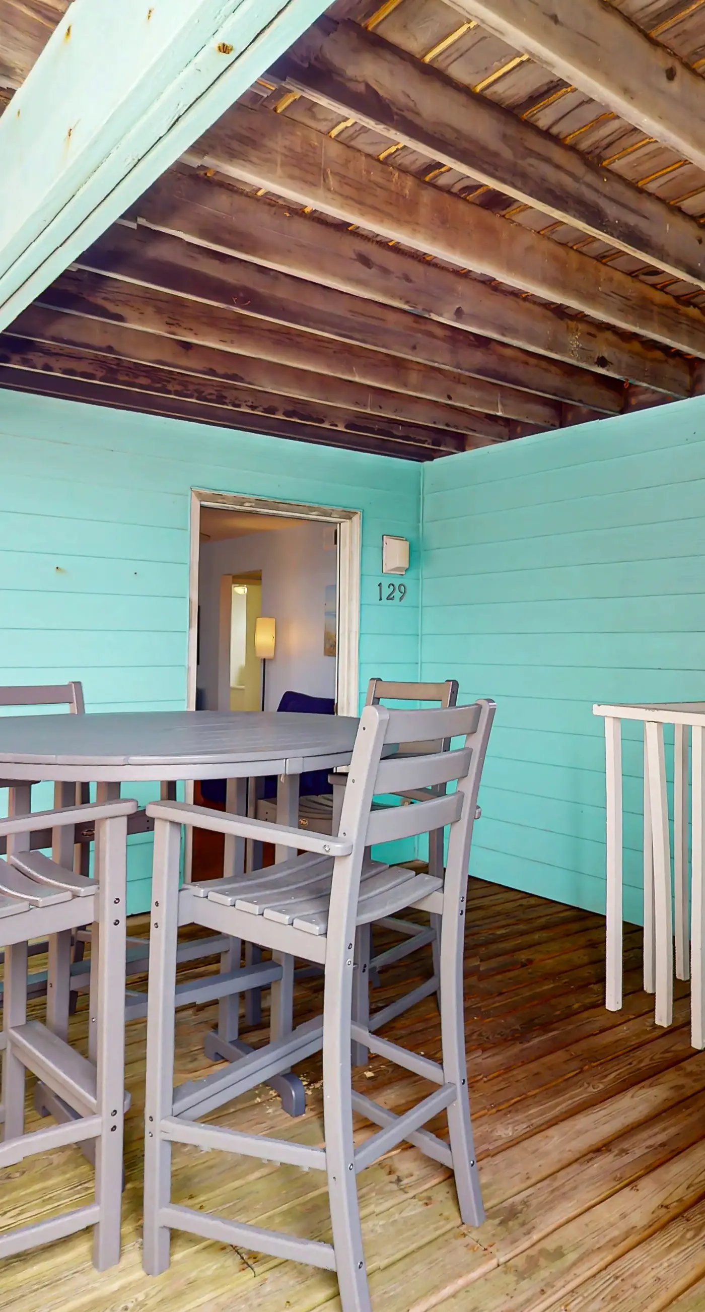 Waterfront condo with a furnished balcony, peek-a-boo Gulf views, & shared pools