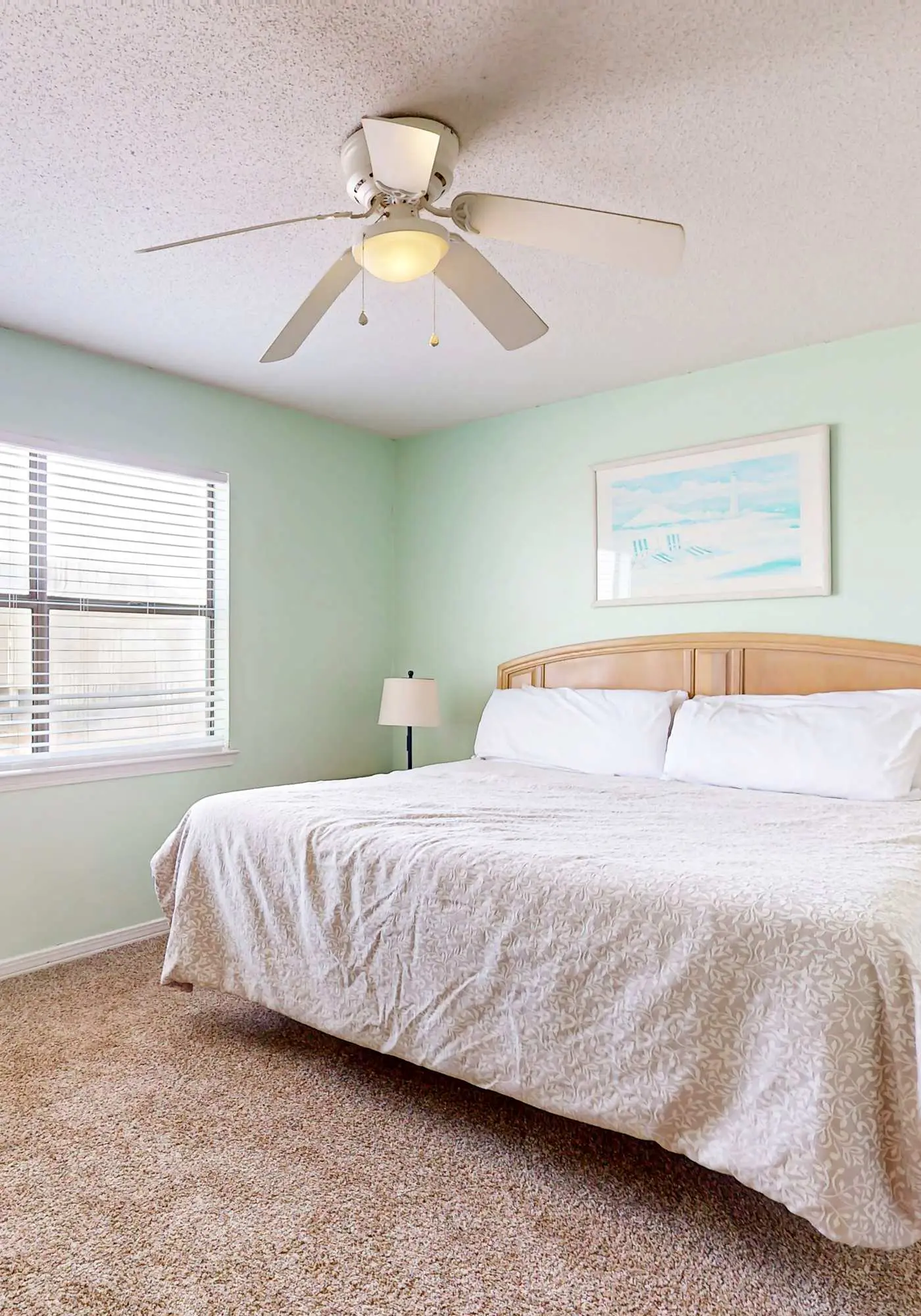 Waterfront condo with a furnished balcony, peek-a-boo Gulf views, & shared pools