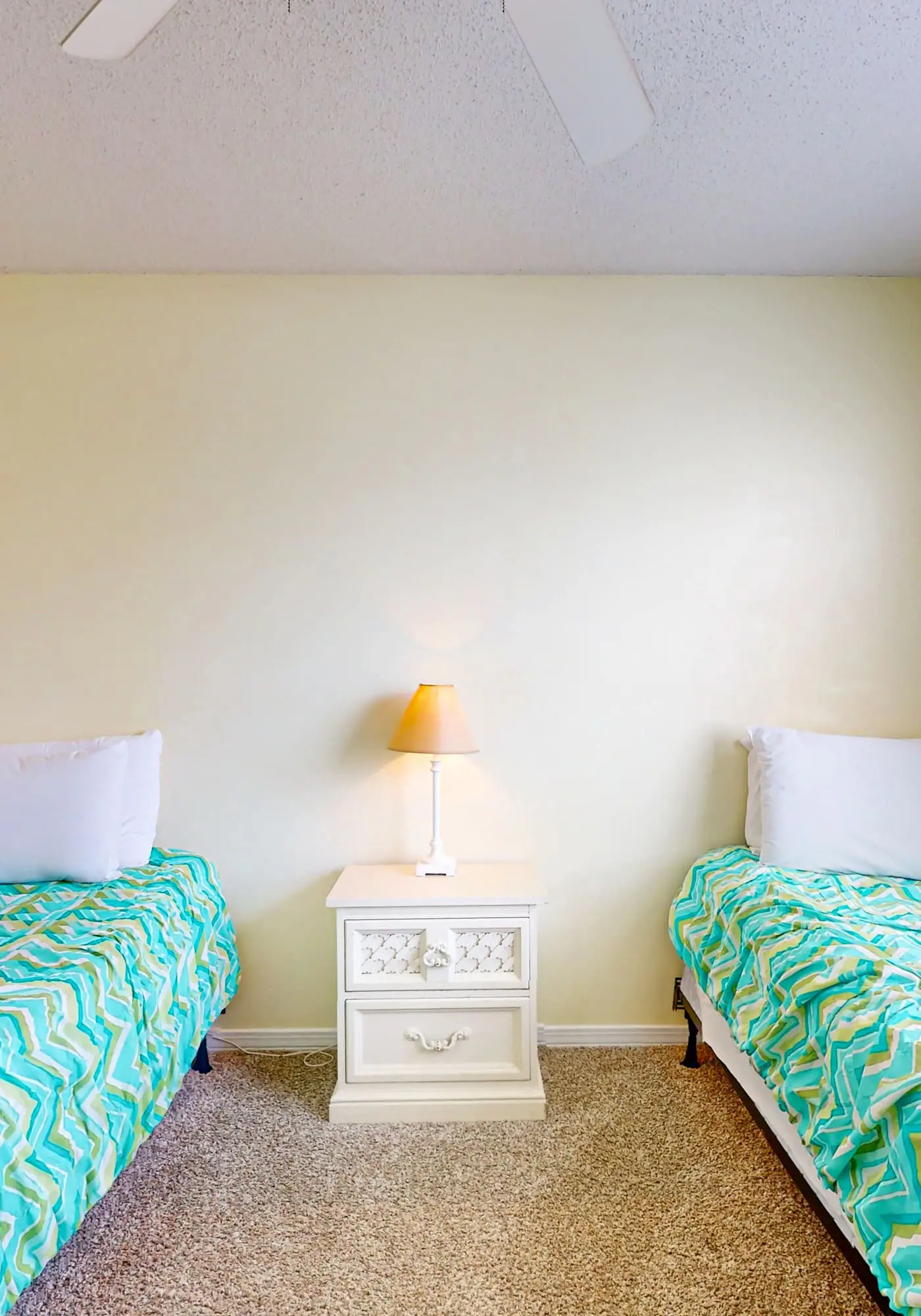 Waterfront condo with a furnished balcony, peek-a-boo Gulf views, & shared pools
