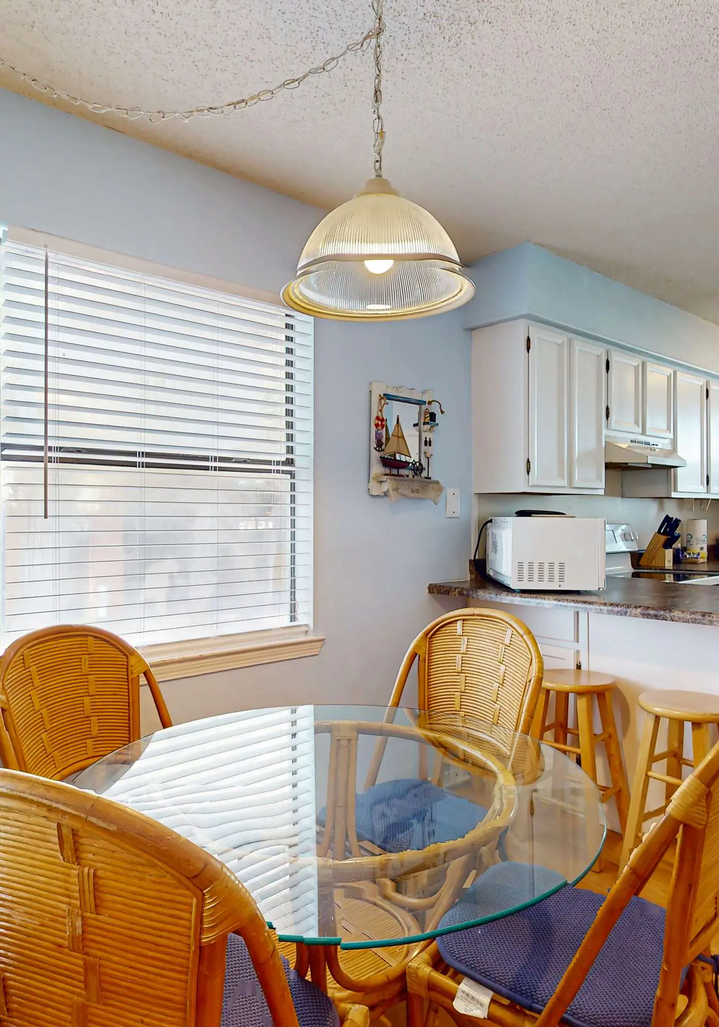 Waterfront condo with a furnished balcony, peek-a-boo Gulf views, & shared pools