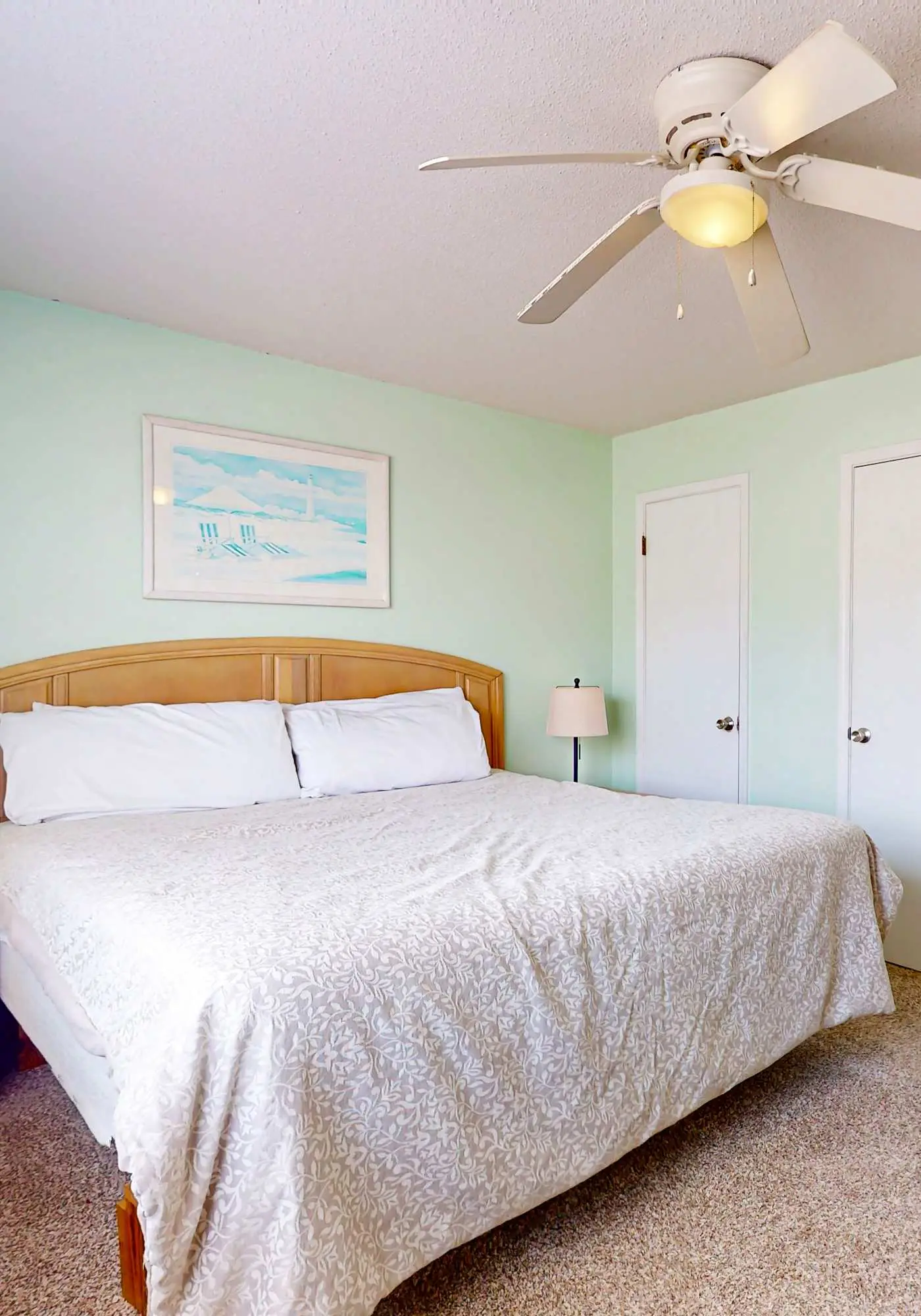 Waterfront condo with a furnished balcony, peek-a-boo Gulf views, & shared pools