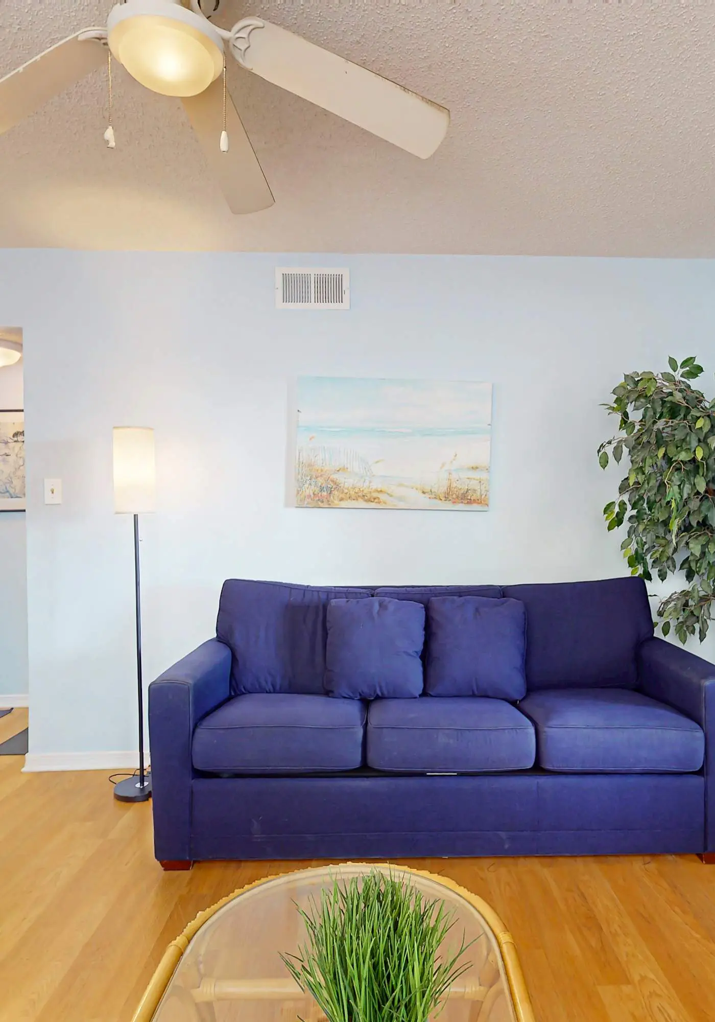 Waterfront condo with a furnished balcony, peek-a-boo Gulf views, & shared pools