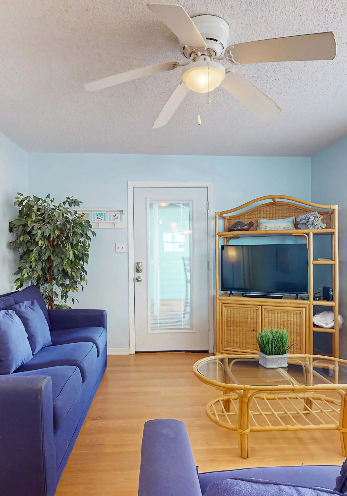 Waterfront condo with a furnished balcony, peek-a-boo Gulf views, & shared pools