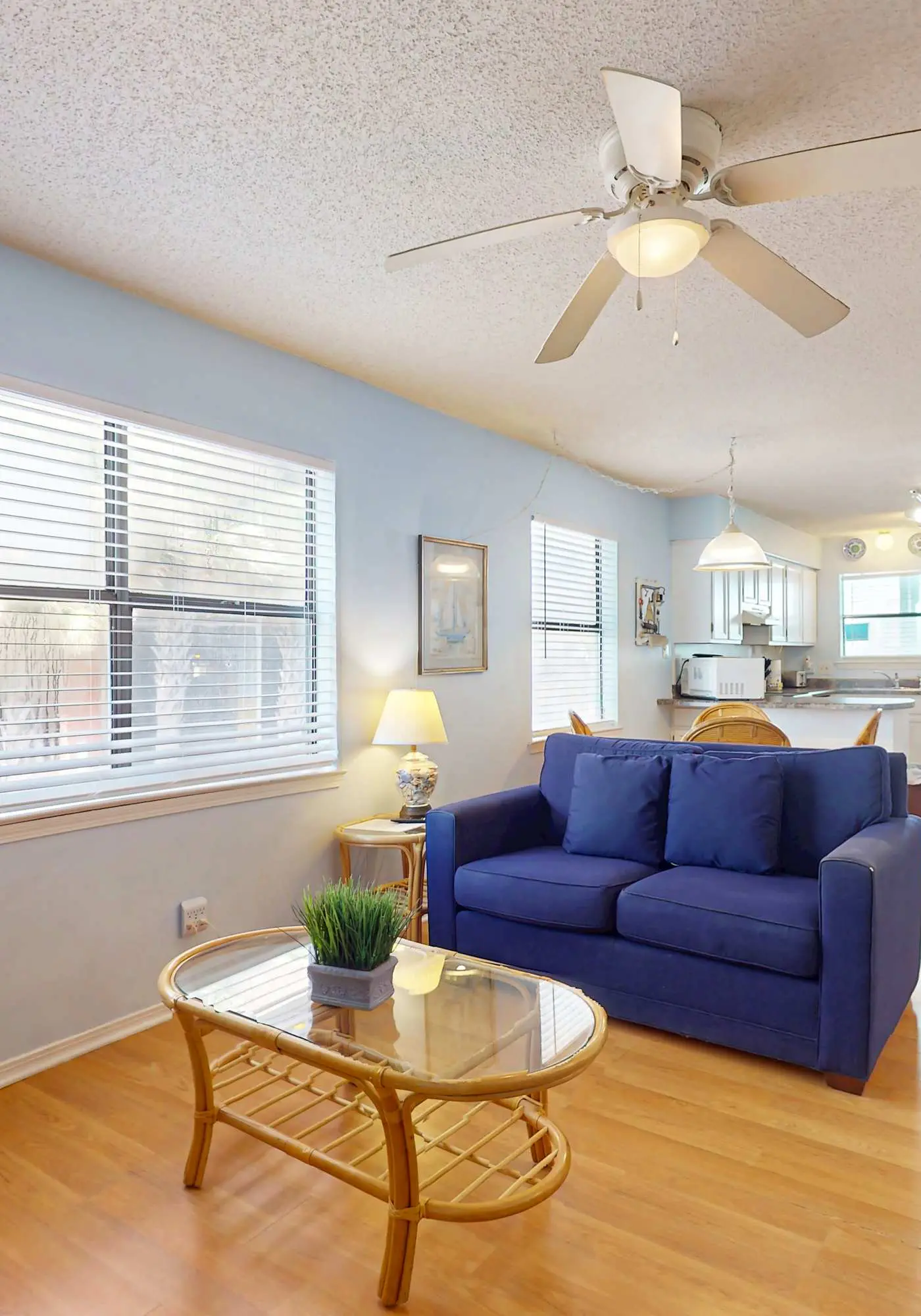 Waterfront condo with a furnished balcony, peek-a-boo Gulf views, & shared pools