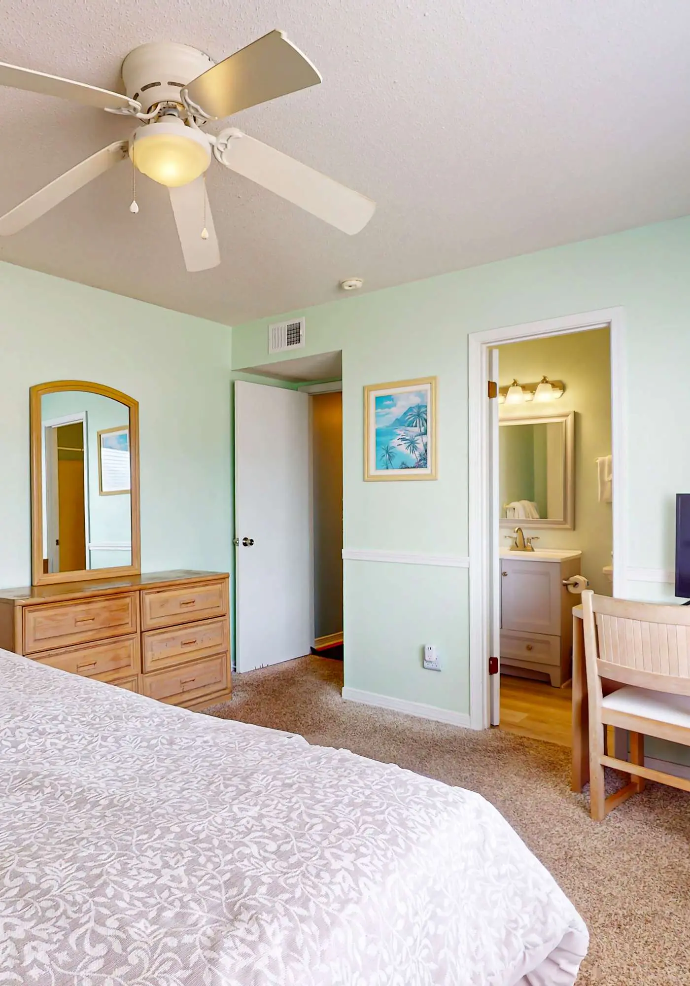 Waterfront condo with a furnished balcony, peek-a-boo Gulf views, & shared pools