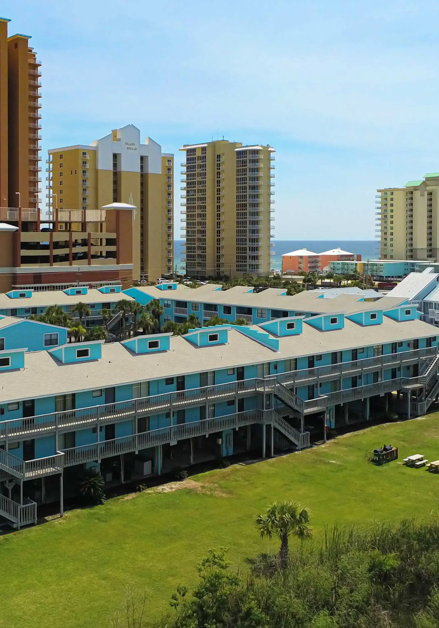 Waterfront condo with a furnished balcony, peek-a-boo Gulf views, & shared pools