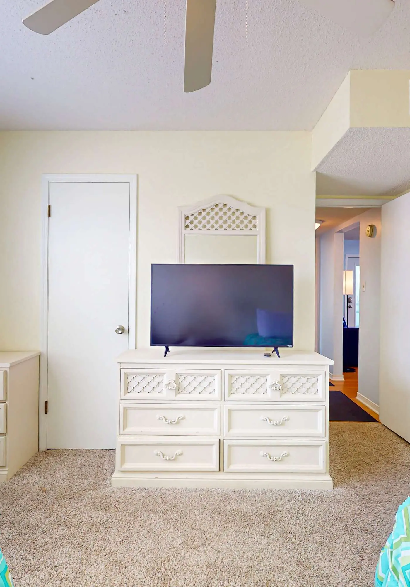 Waterfront condo with a furnished balcony, peek-a-boo Gulf views, & shared pools