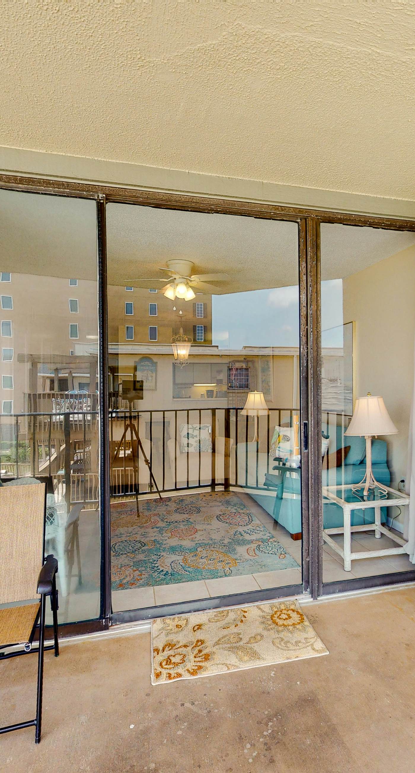 Beachfront condo with balcony overlooking Gulf of Mexico & resort pool