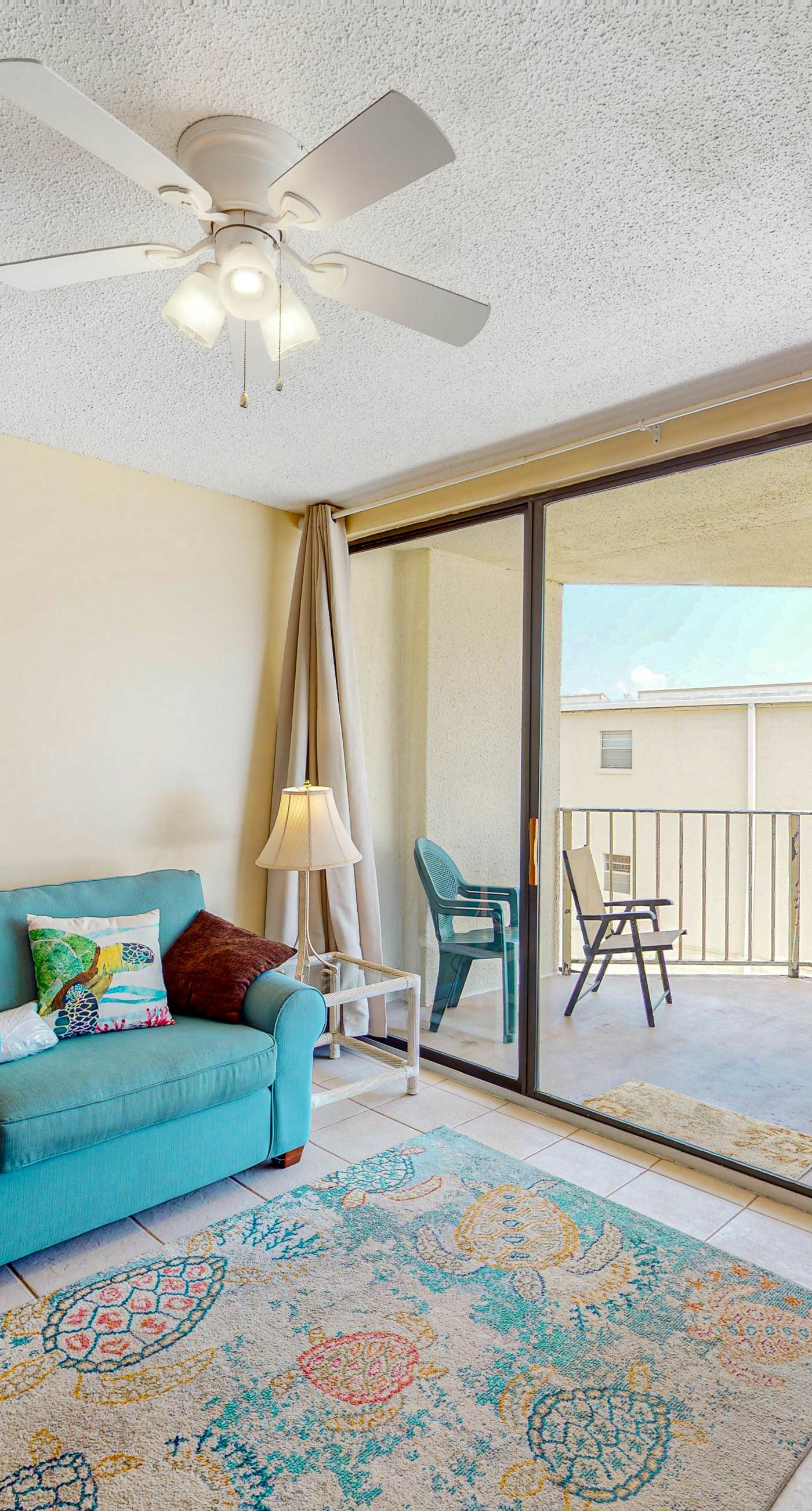 Beachfront condo with balcony overlooking Gulf of Mexico & resort pool