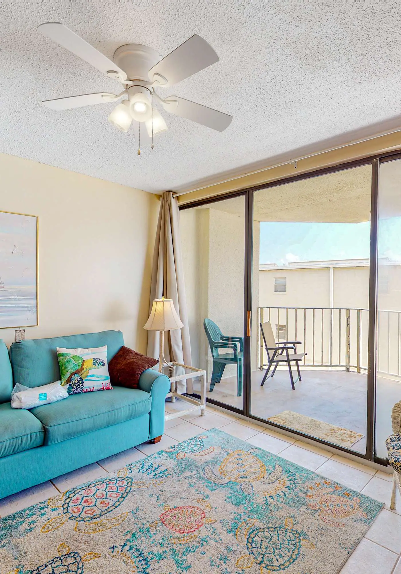 Beachfront condo with balcony overlooking Gulf of Mexico & resort pool