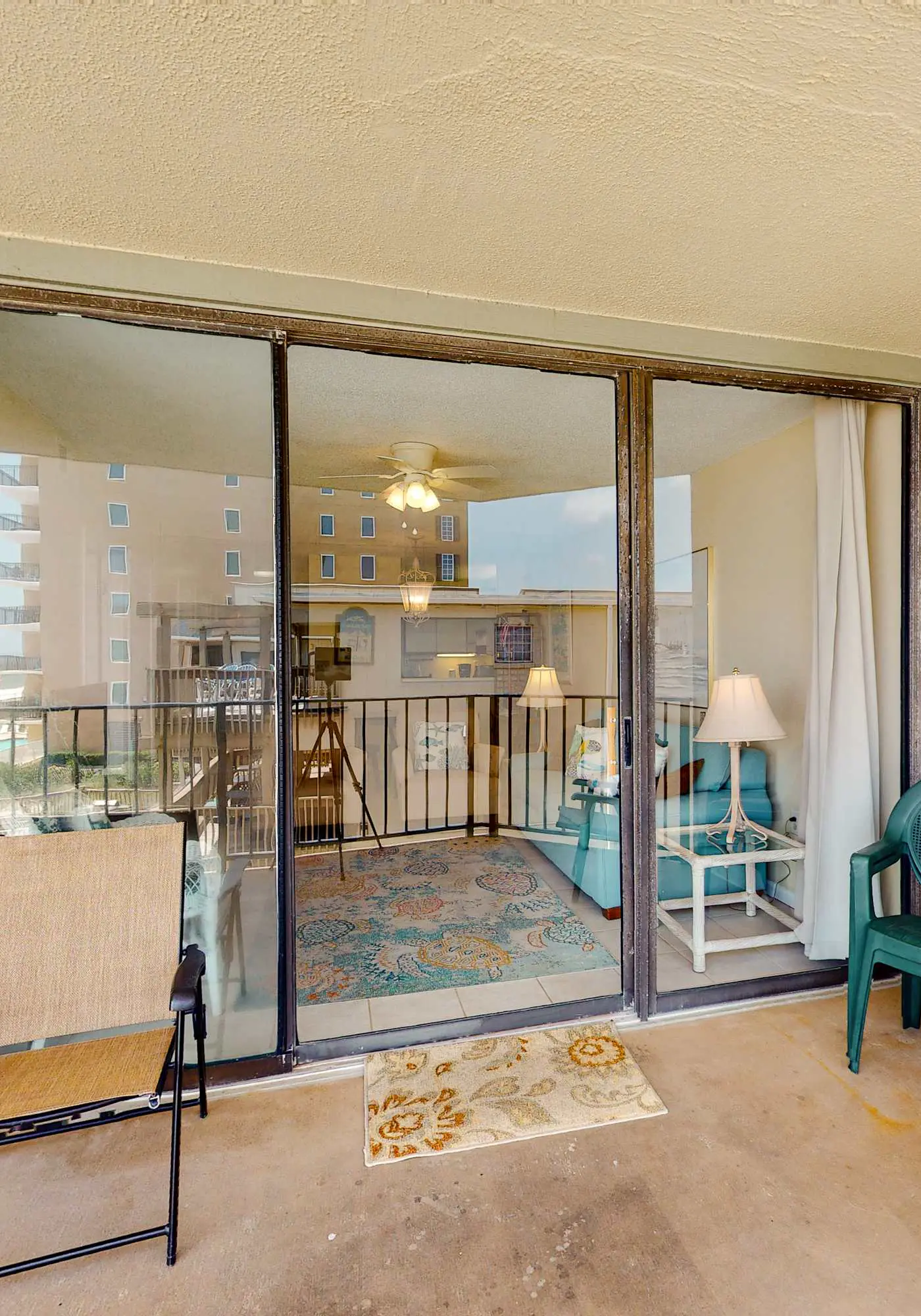 Beachfront condo with balcony overlooking Gulf of Mexico & resort pool